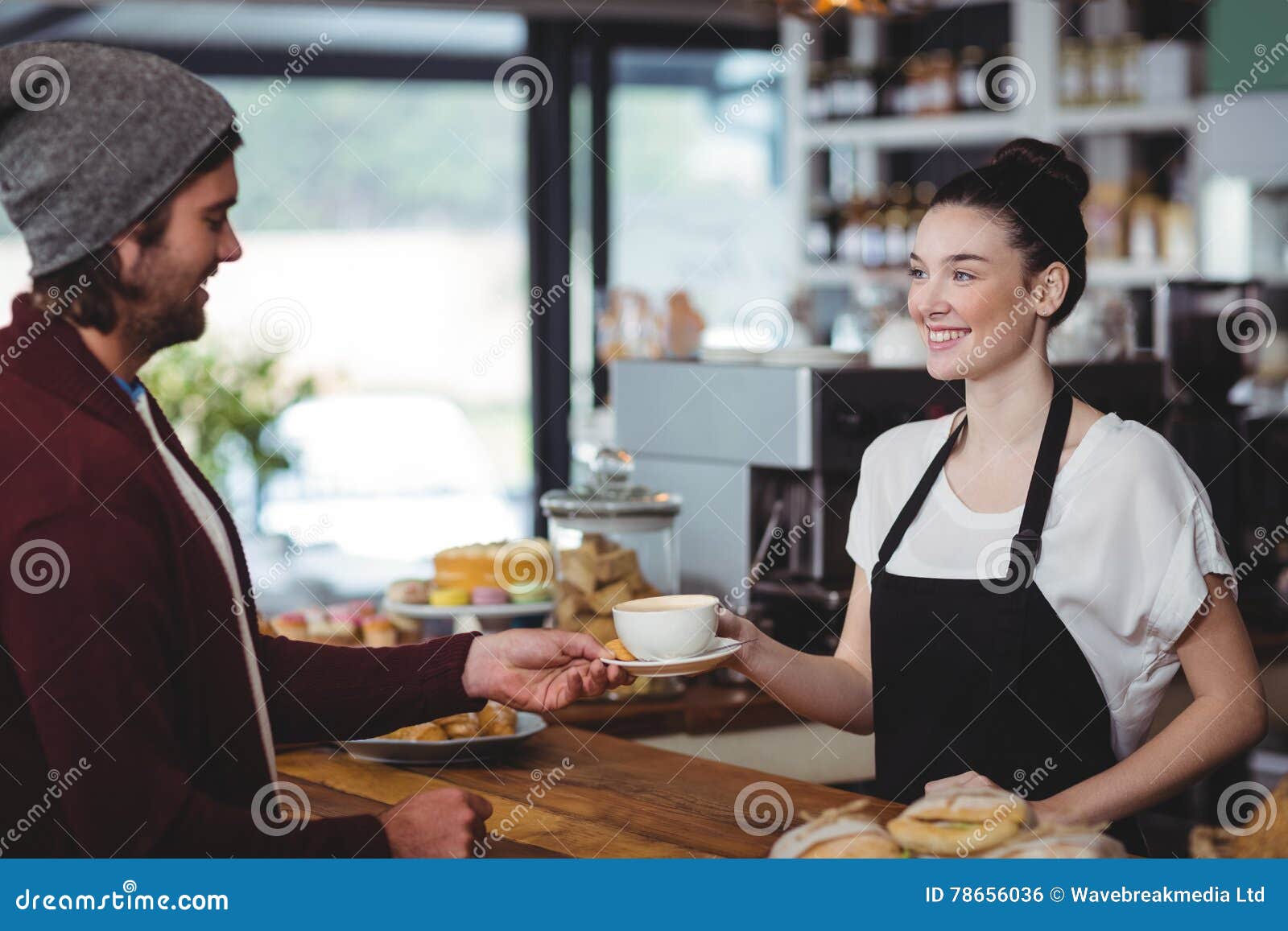 Waitress Serving a Cup of Coffee To Customer Stock Photo Image of