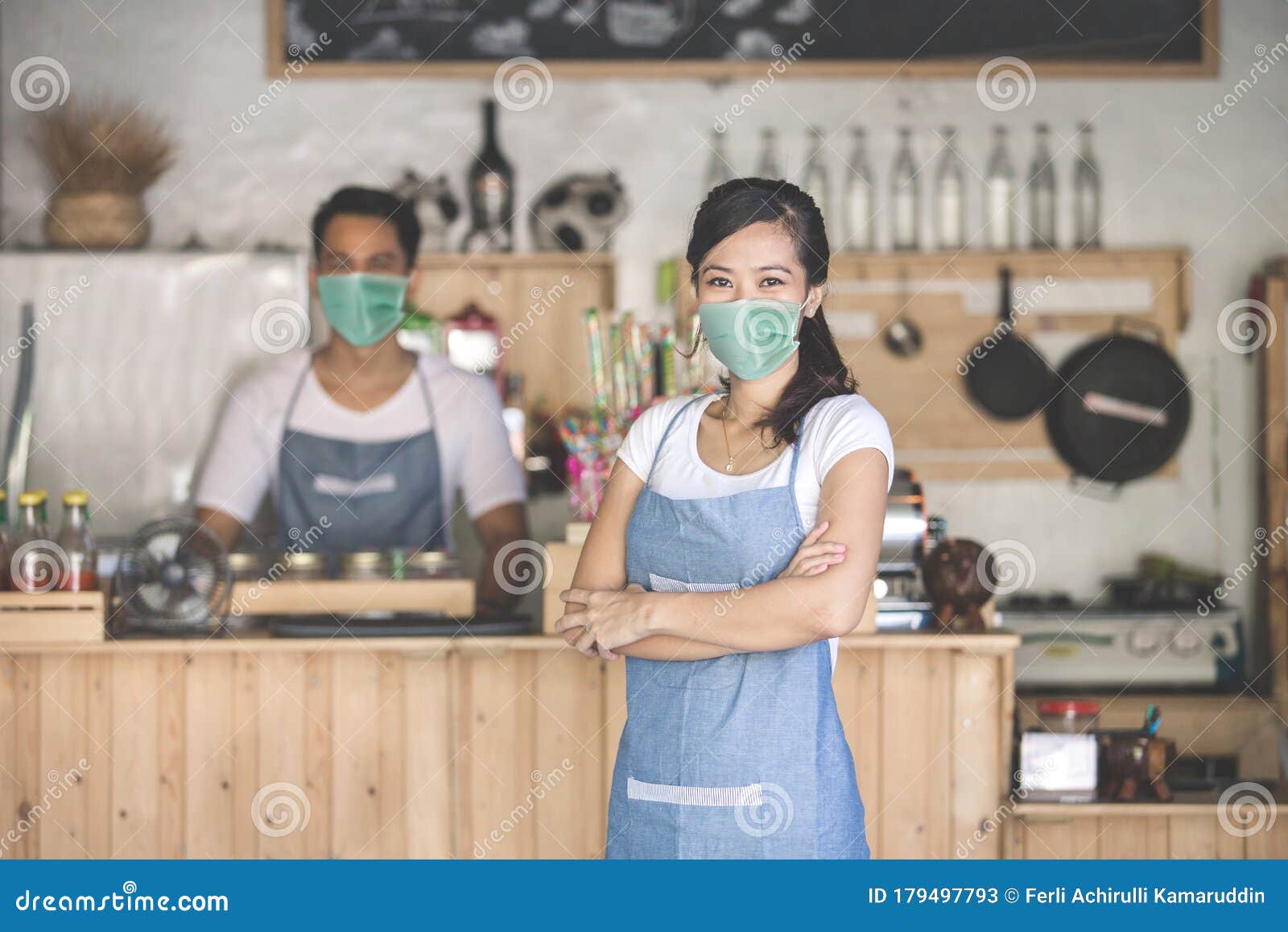 waitress at the shop wear face masks