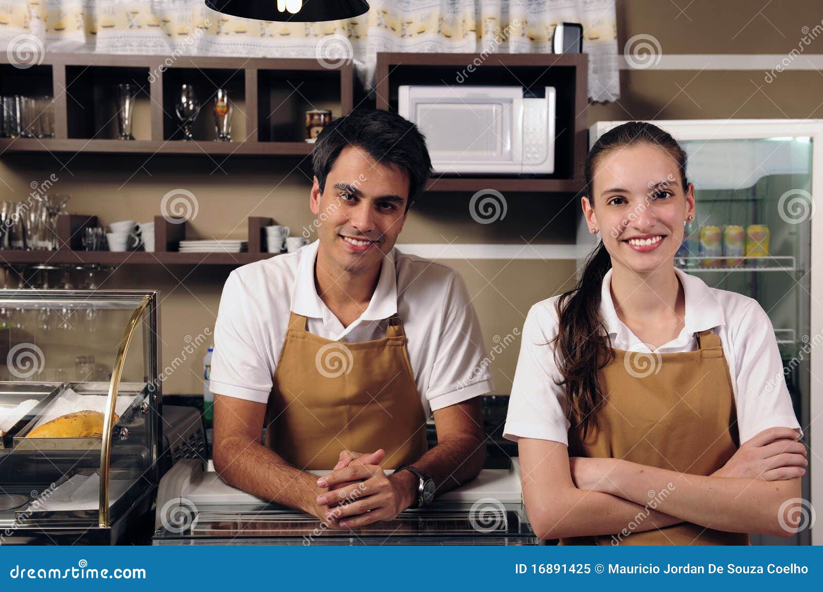 Waitress and Waiter Working at a Cafe Stock Image Image of apron