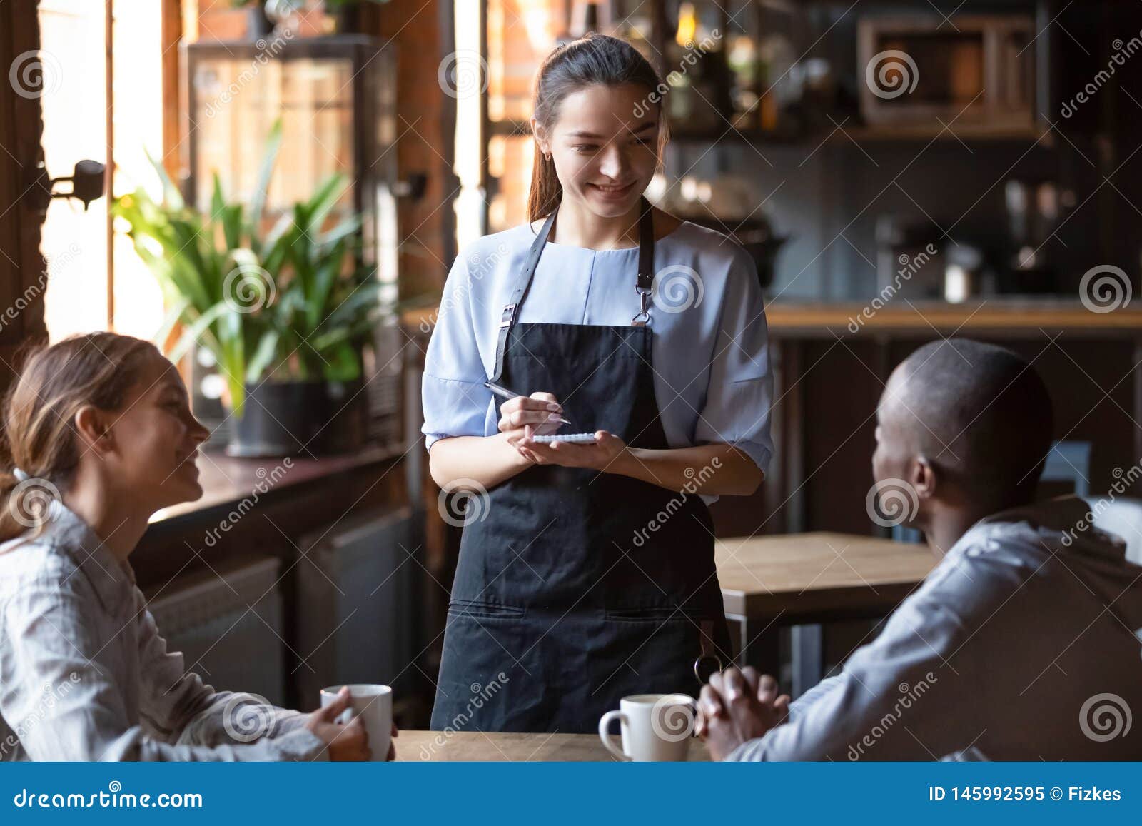Waitress Welcoming Restaurant Guests Take Order Writing On Notepad Stock Image Image Of
