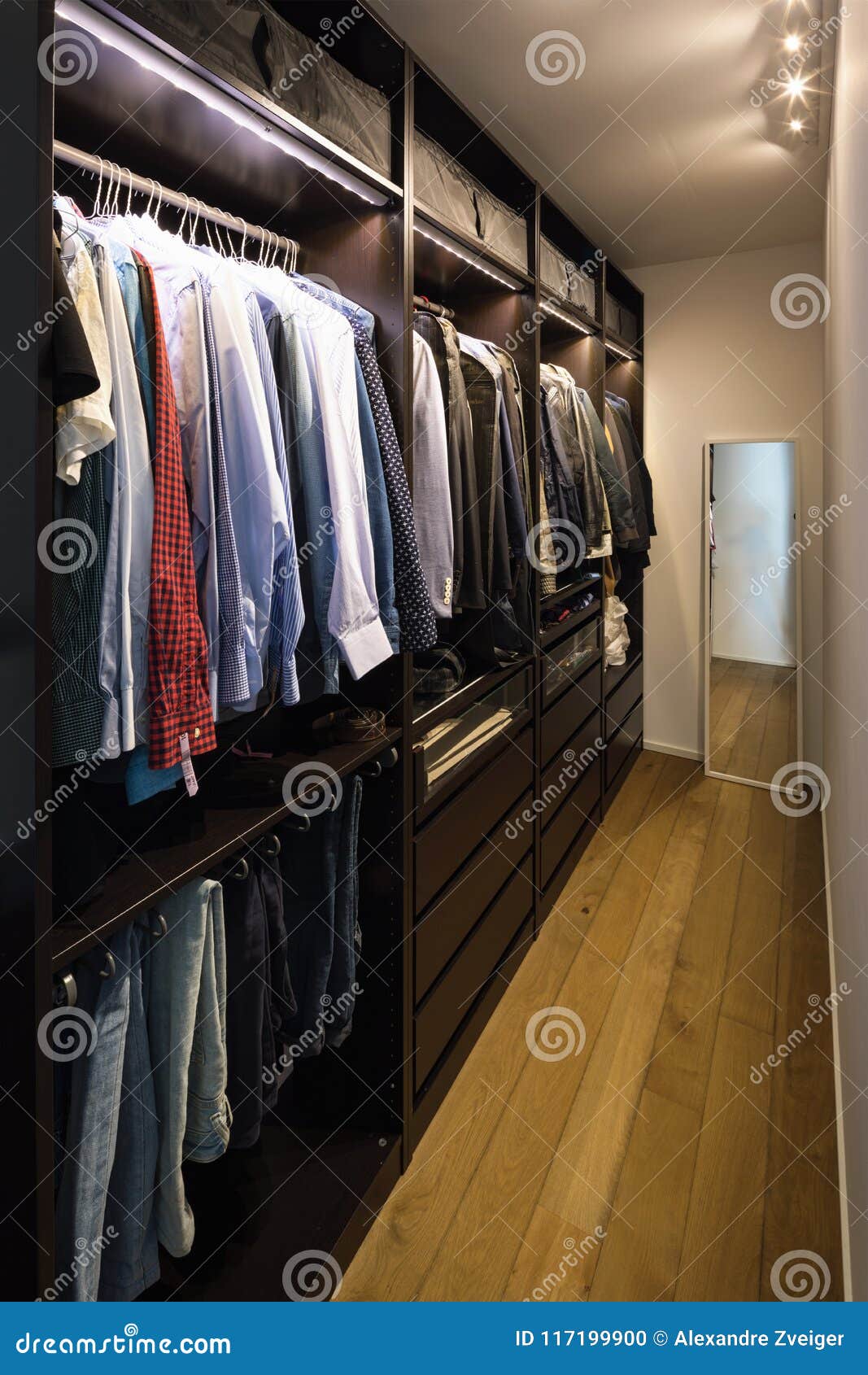 Walk-in Closet Full of Clothes Stock Photo - Image of wall, apartment ...