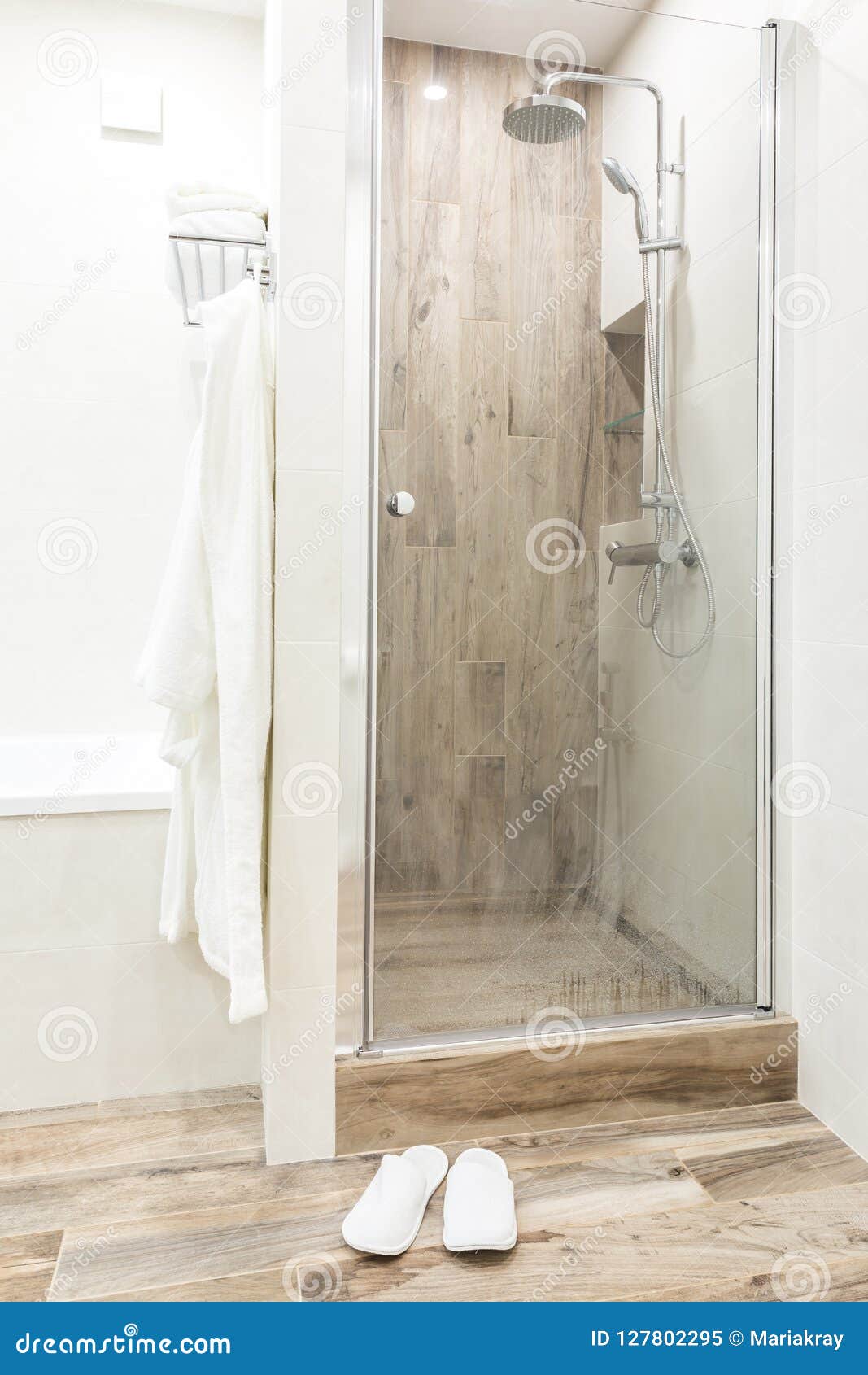 Walk In Shower In Bathroom With Wooden Style Tile Stock Image