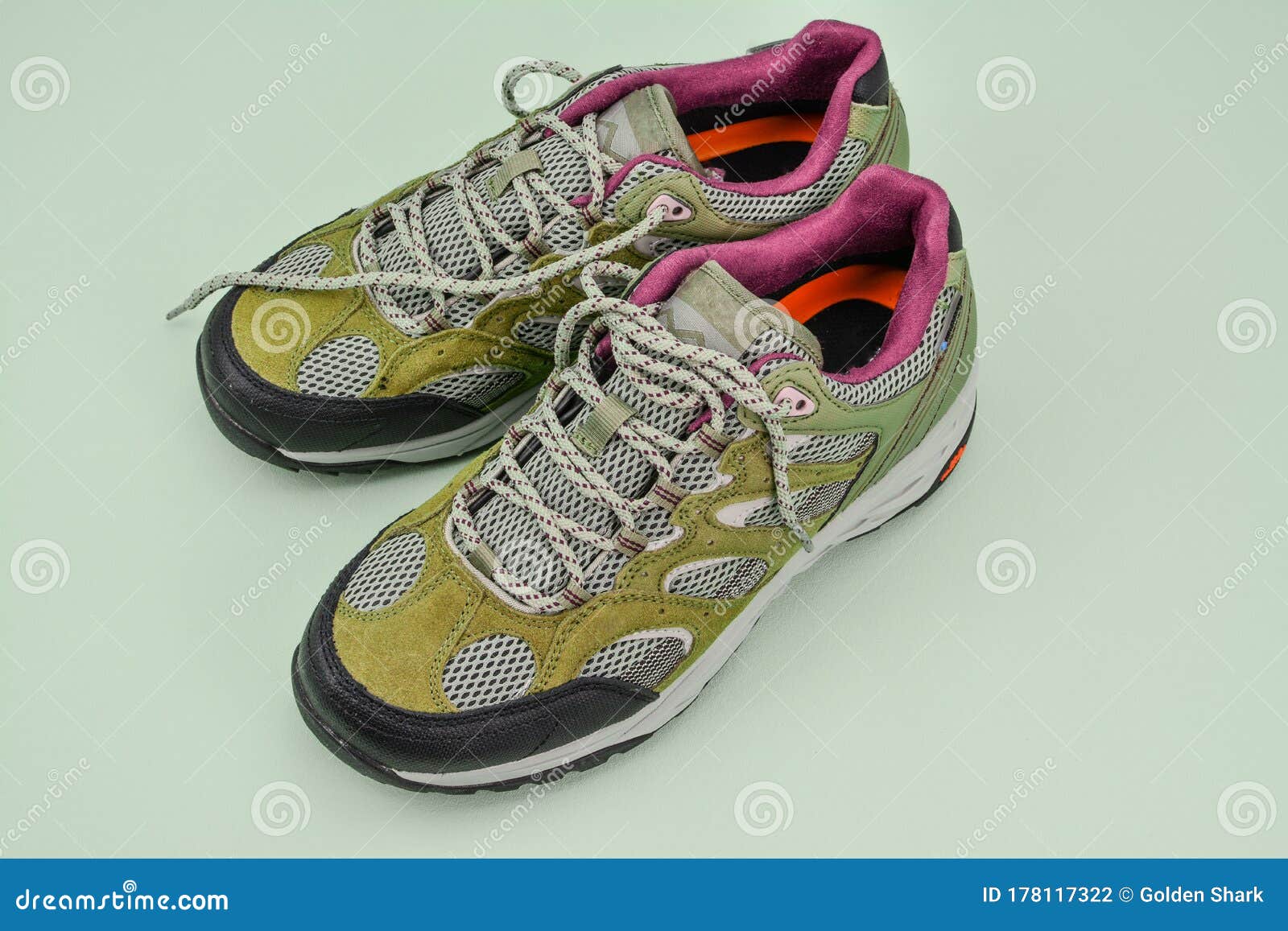 Walking Boots on Green Background Stock Photo - Image of preparation ...