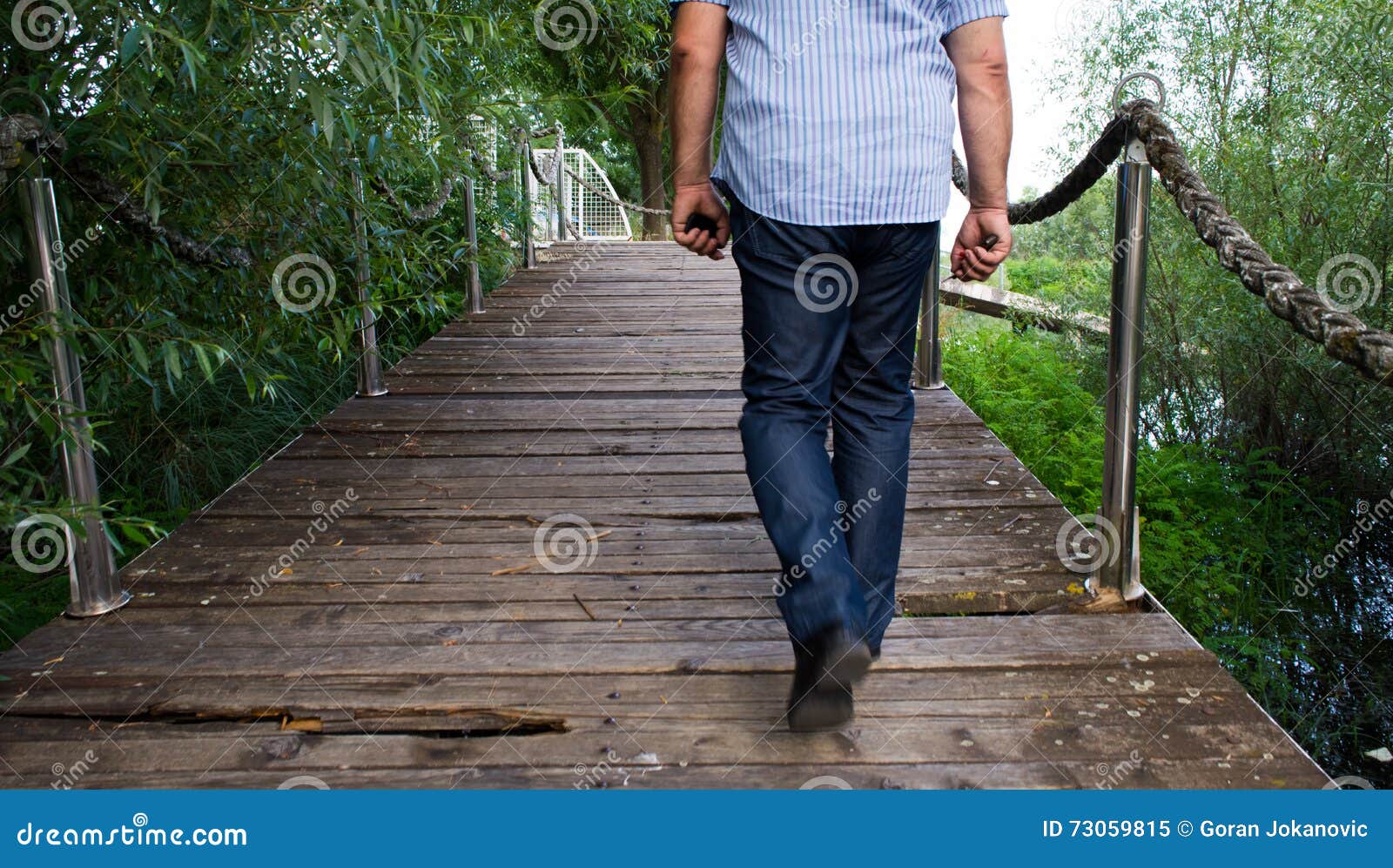 Walking over bridge stock image. Image of summer, exercise - 73059815