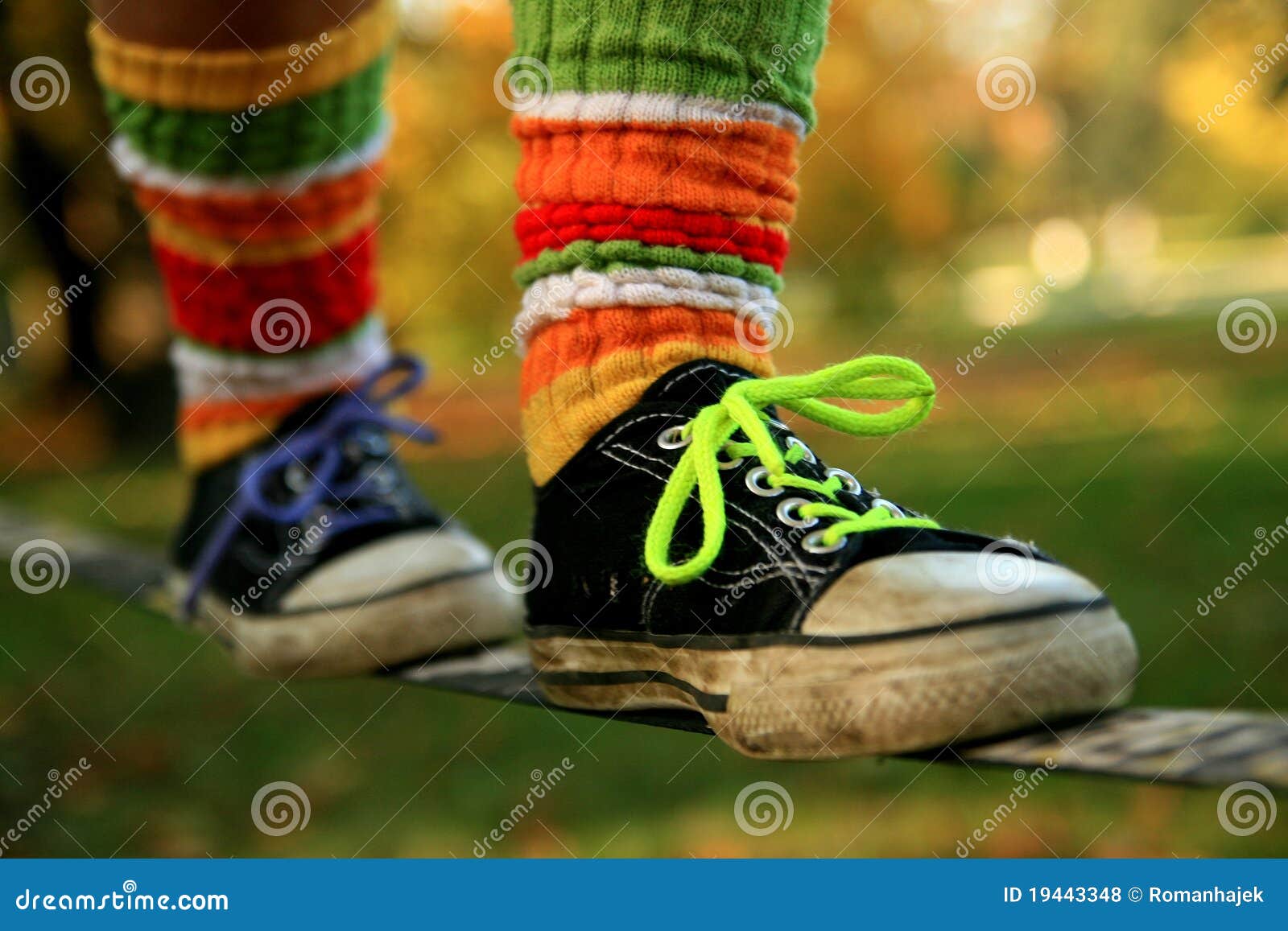 Walking the Slackline in Sneakers and Colour Socks Stock Photo Image