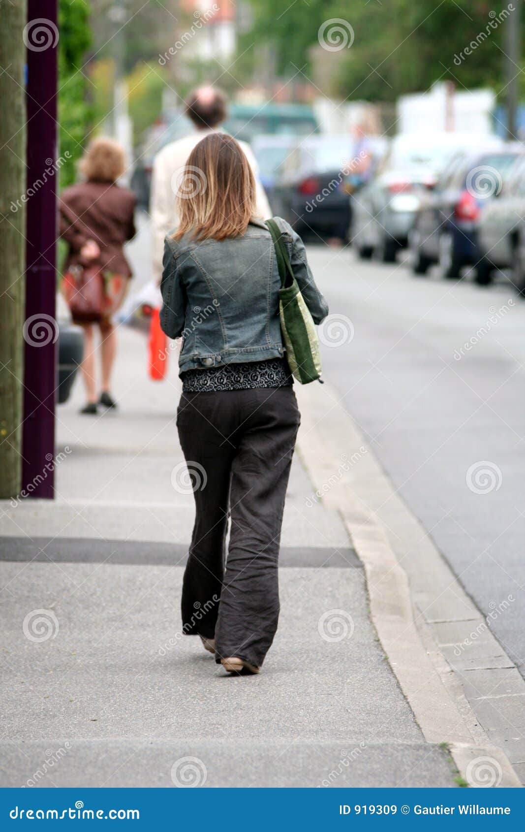 Walking in the street stock image. Image of action, loneliness 919309