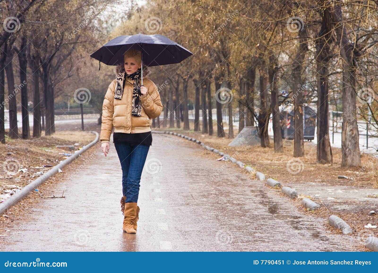 Walking under rain stock image. Image of casual, beauty 7790451
