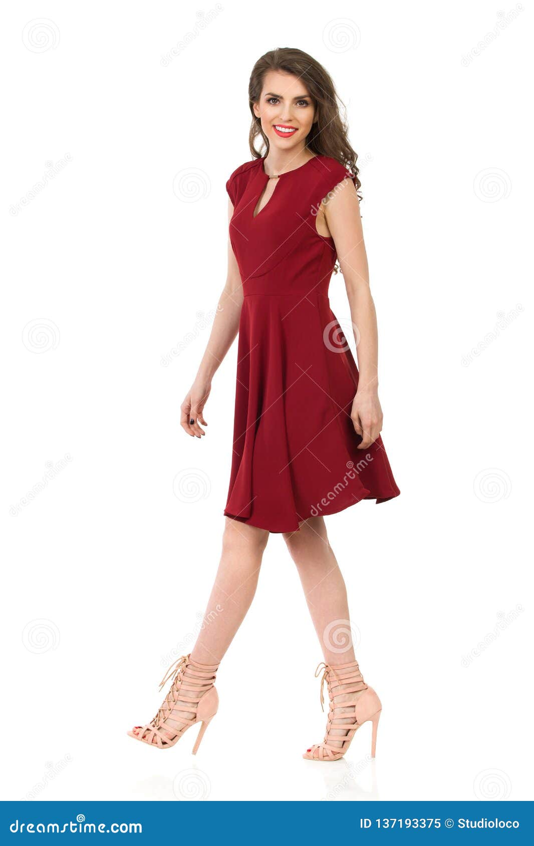 Walking Woman in Elegant Burgundy Dress. Side View Stock Image - Image ...