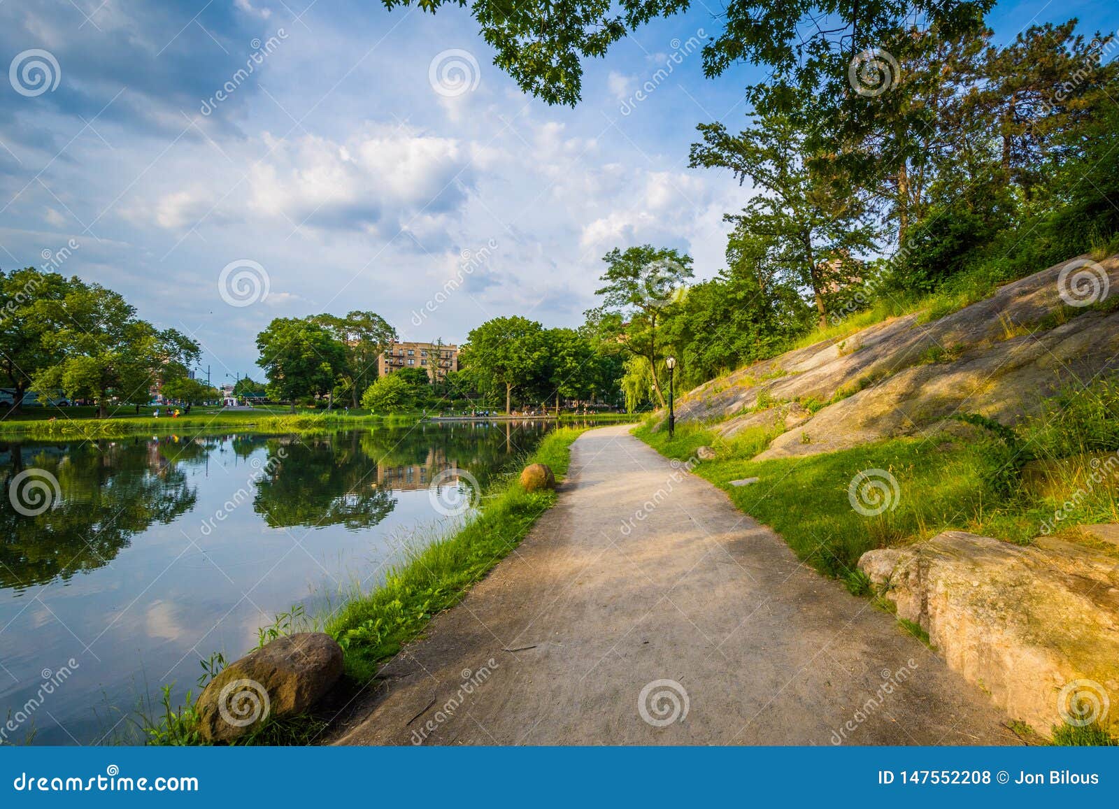 walkway along harlem meer in central park, manhattan, new york city