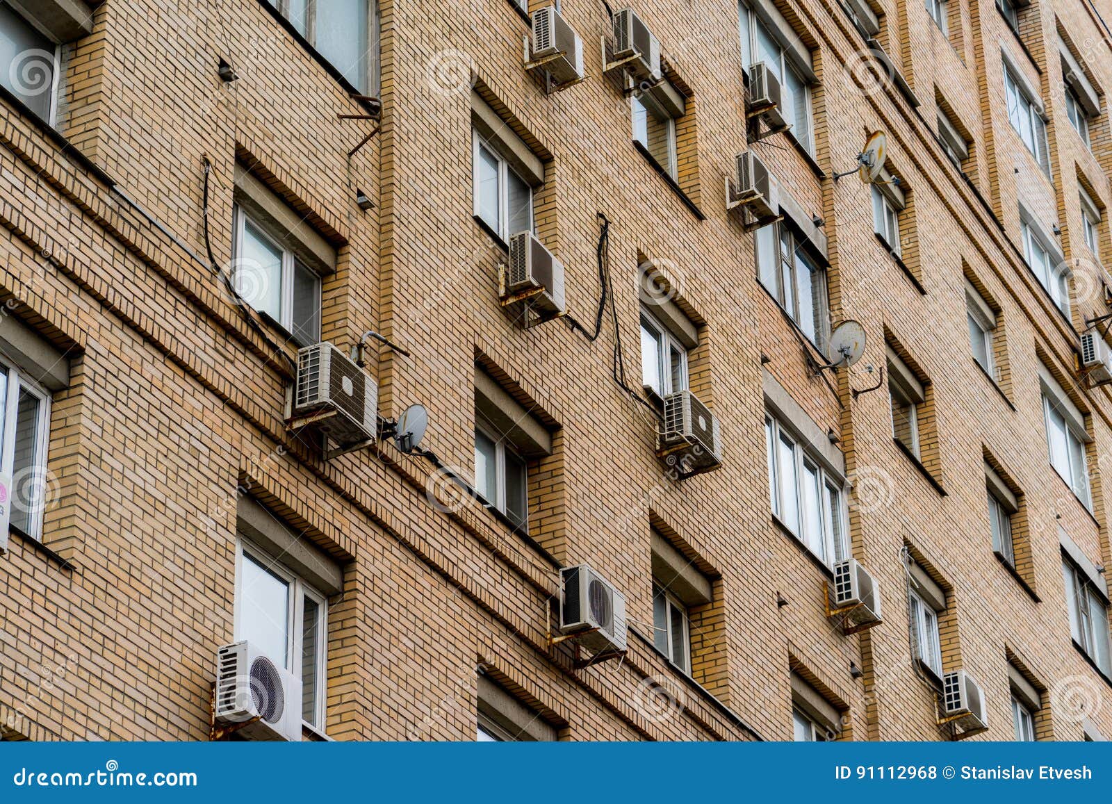 The Wall of an Apartment House with Air Conditioning Stock Photo