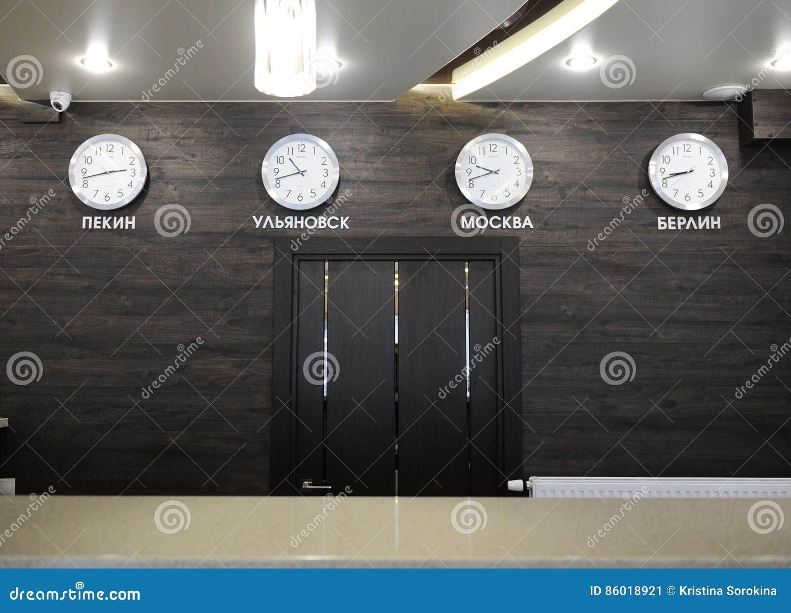 Wall Clocks with Different Time Zones. at the Reception at the Hotel