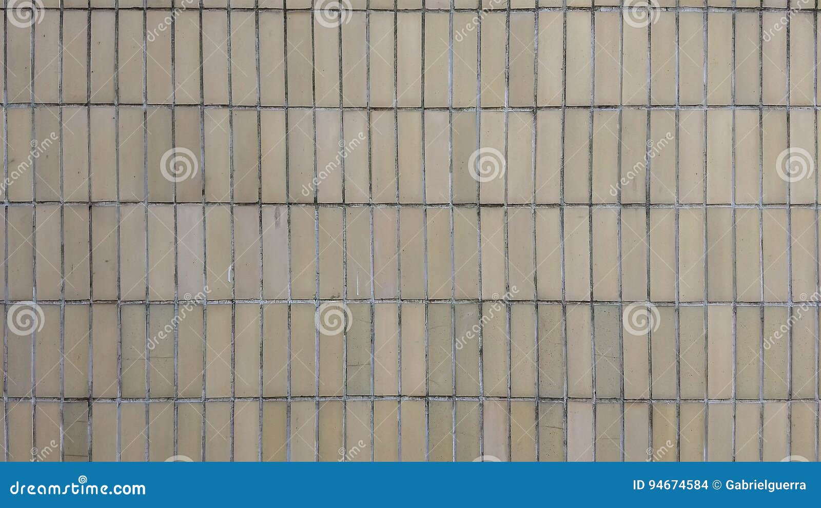 wall of cream tiles in rectagular format
