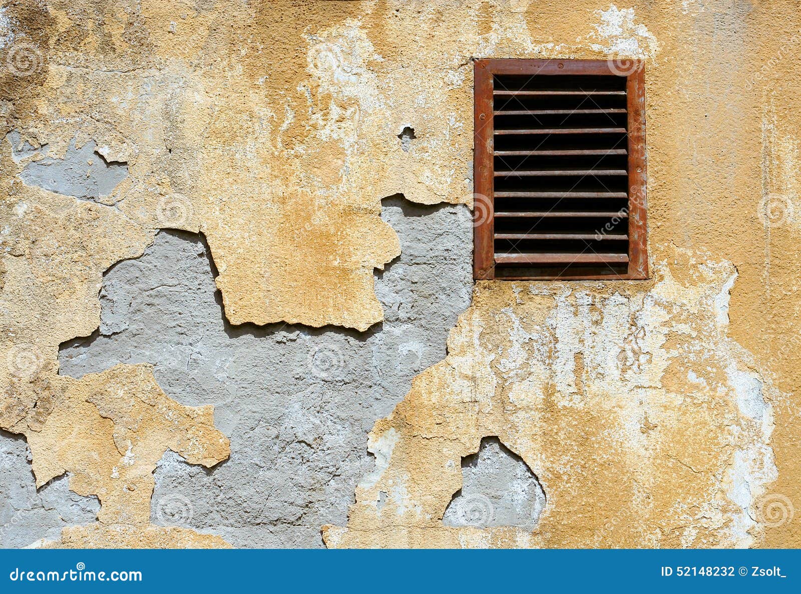 Wall Crumbling Plaster Coat and Rusty Ventilation Grid Stock Photo