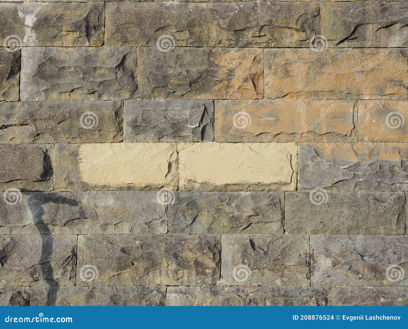 Wall with Embossed Rectangular Stone Tiles with a Rough Texture and ...