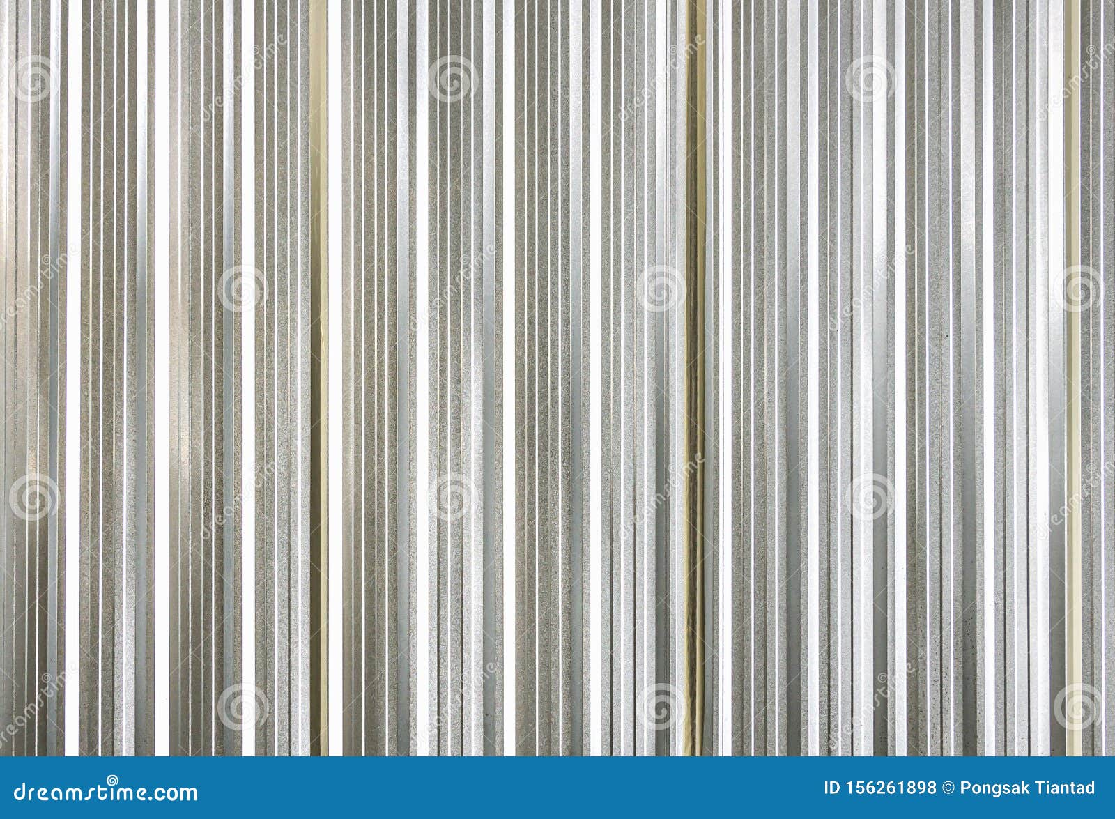 Wall Or Fence Made Of Galvanized Steel Sheet Has A Small Wavy Appearance, Is Durable And Strong