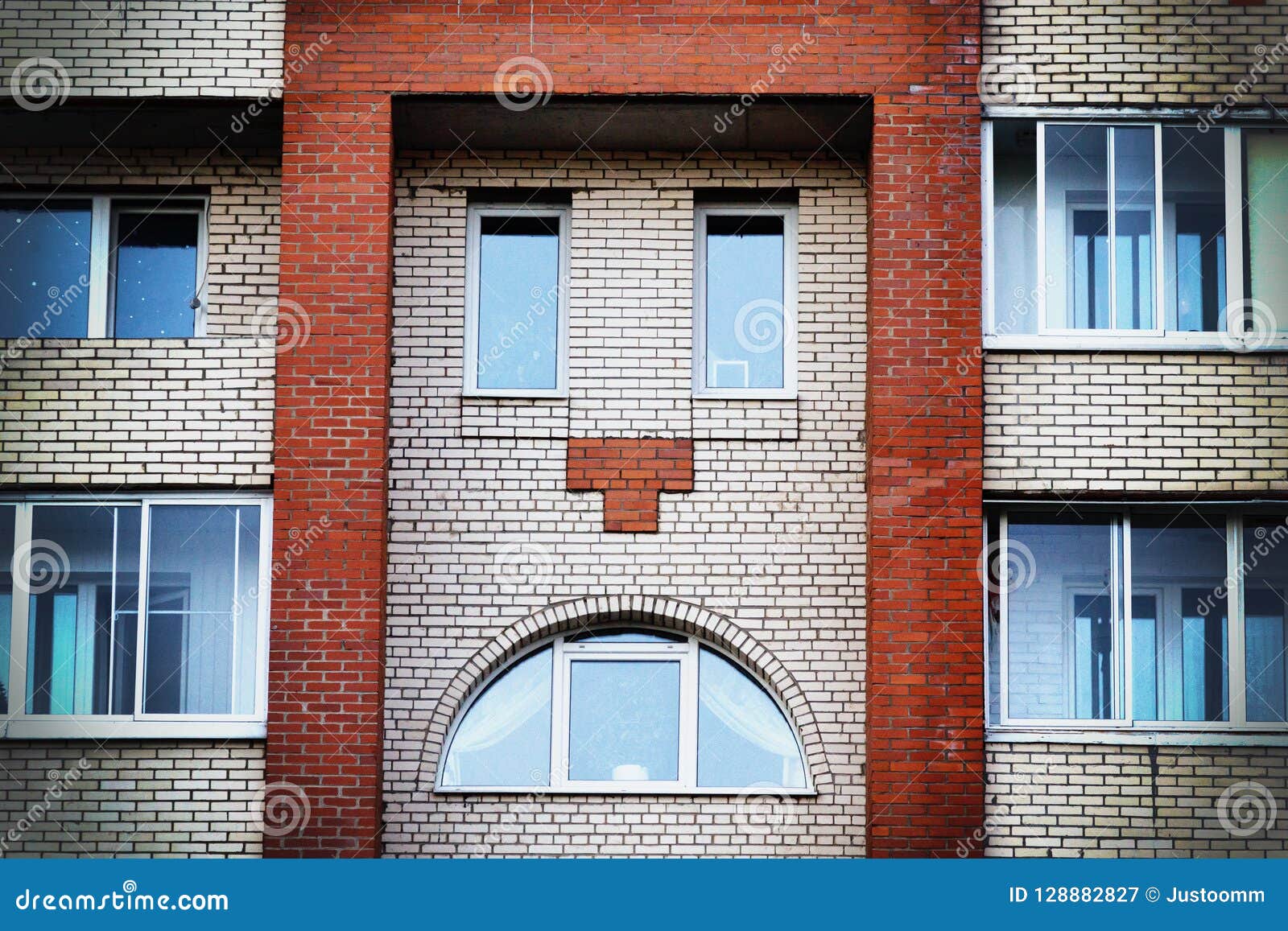 The Wall of a House Looks Like an Evil or Crying Face Stock Image