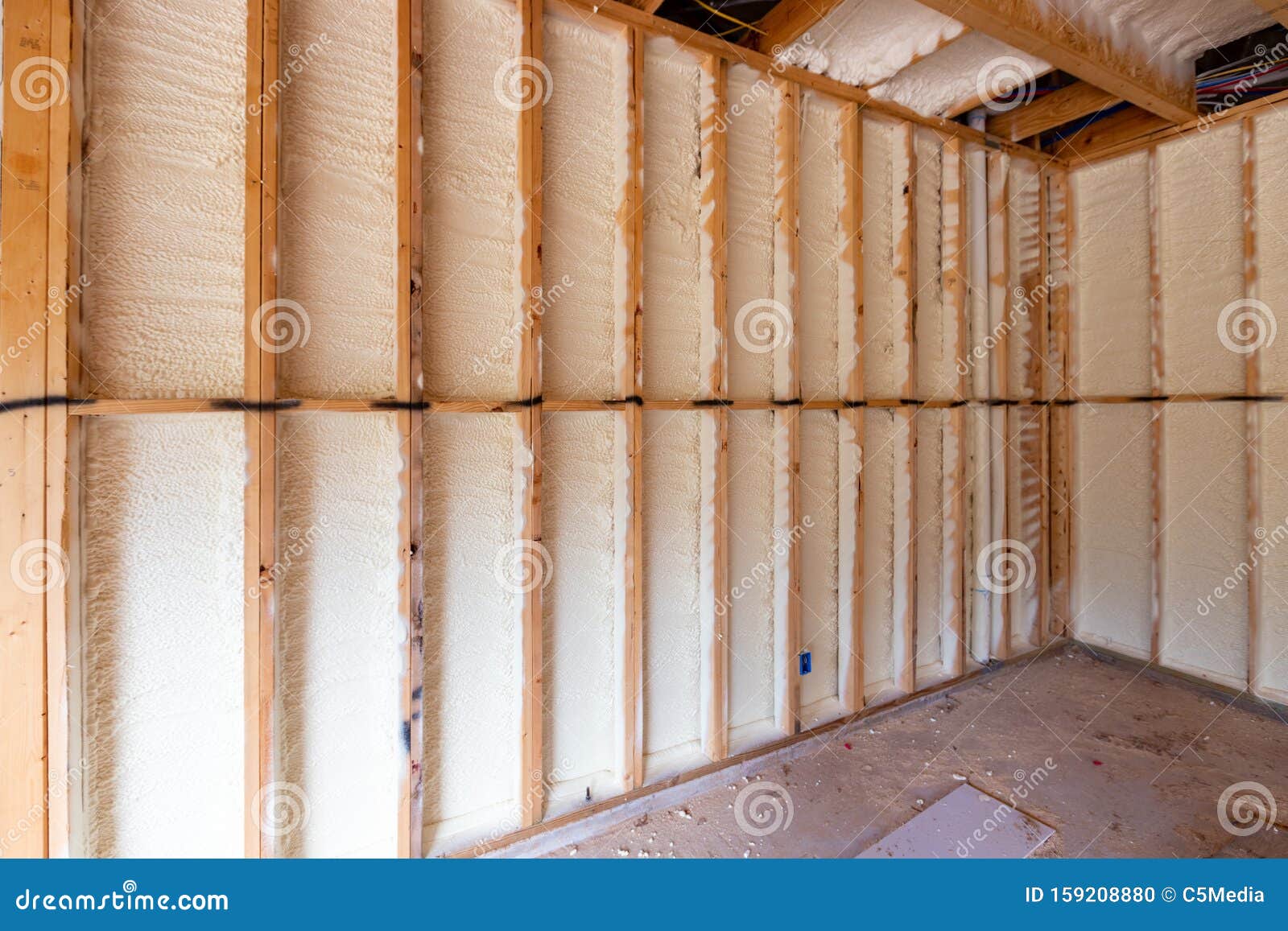 Wall In New Home Under Construction With Spray Foam Insulation