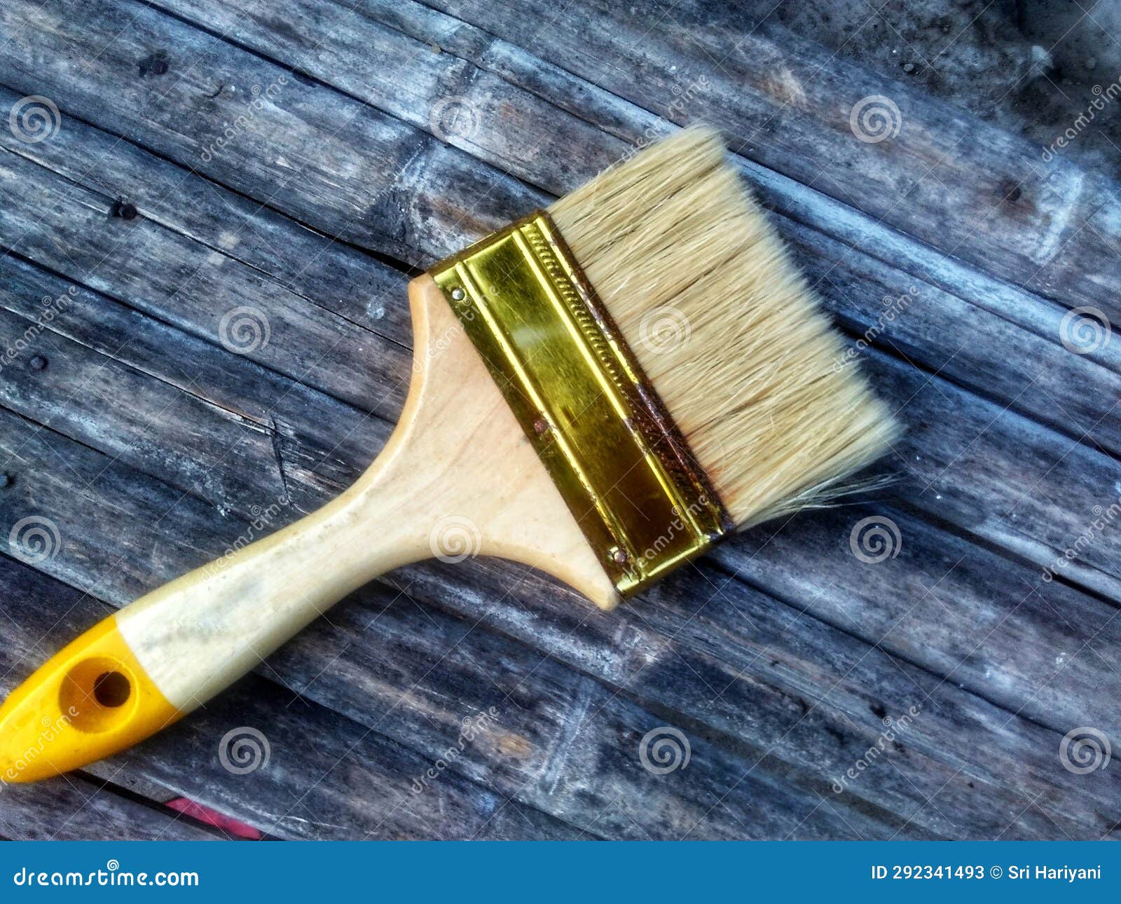 A Wall Paint Brush on Worn Bamboo Stock Image Image of yellow