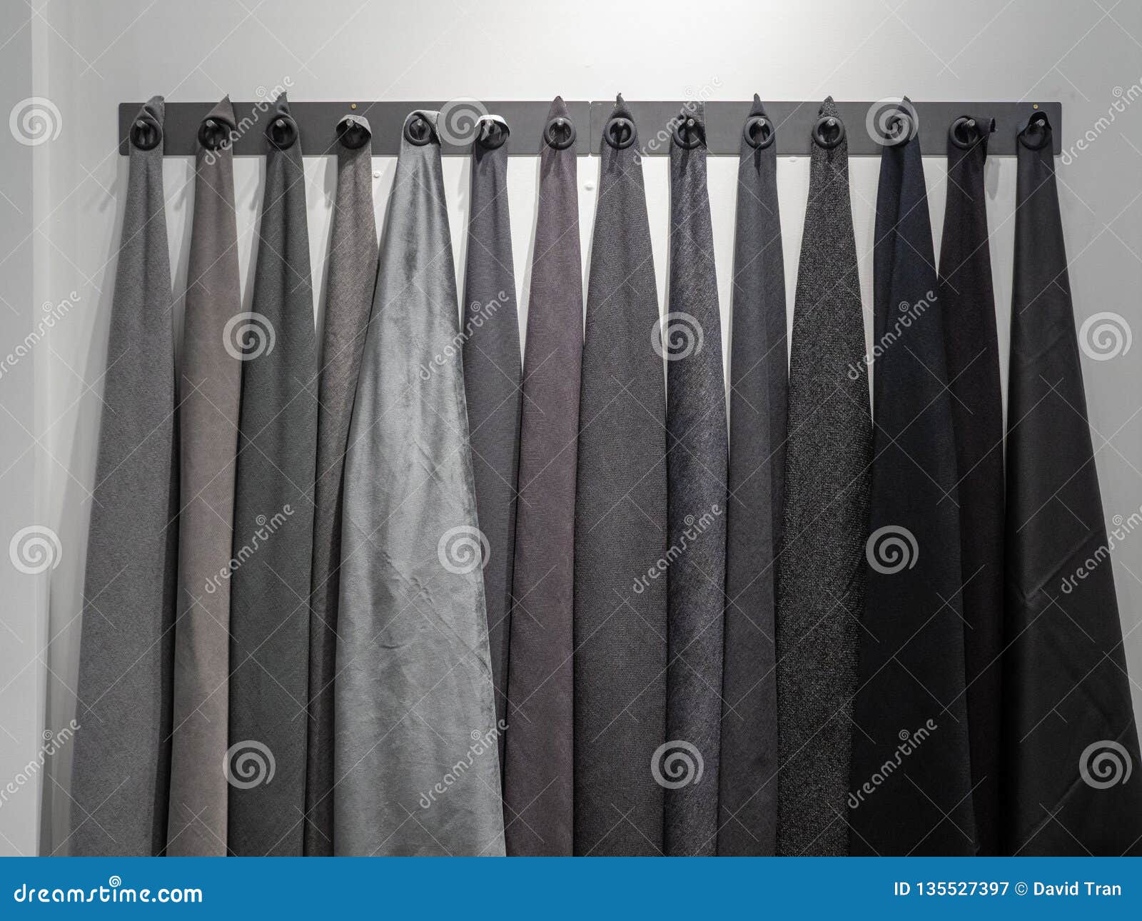 Wall Rack with Dark Shades of Gray and Black Materials of Sample