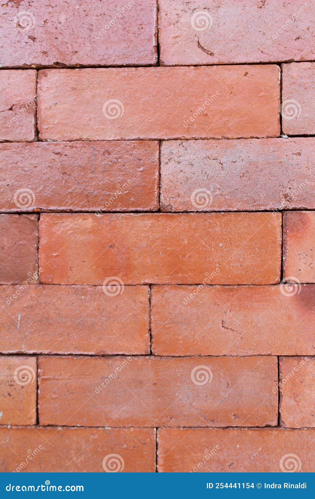 A wall of red bricks stock photo. Image of floor, rock 254441154