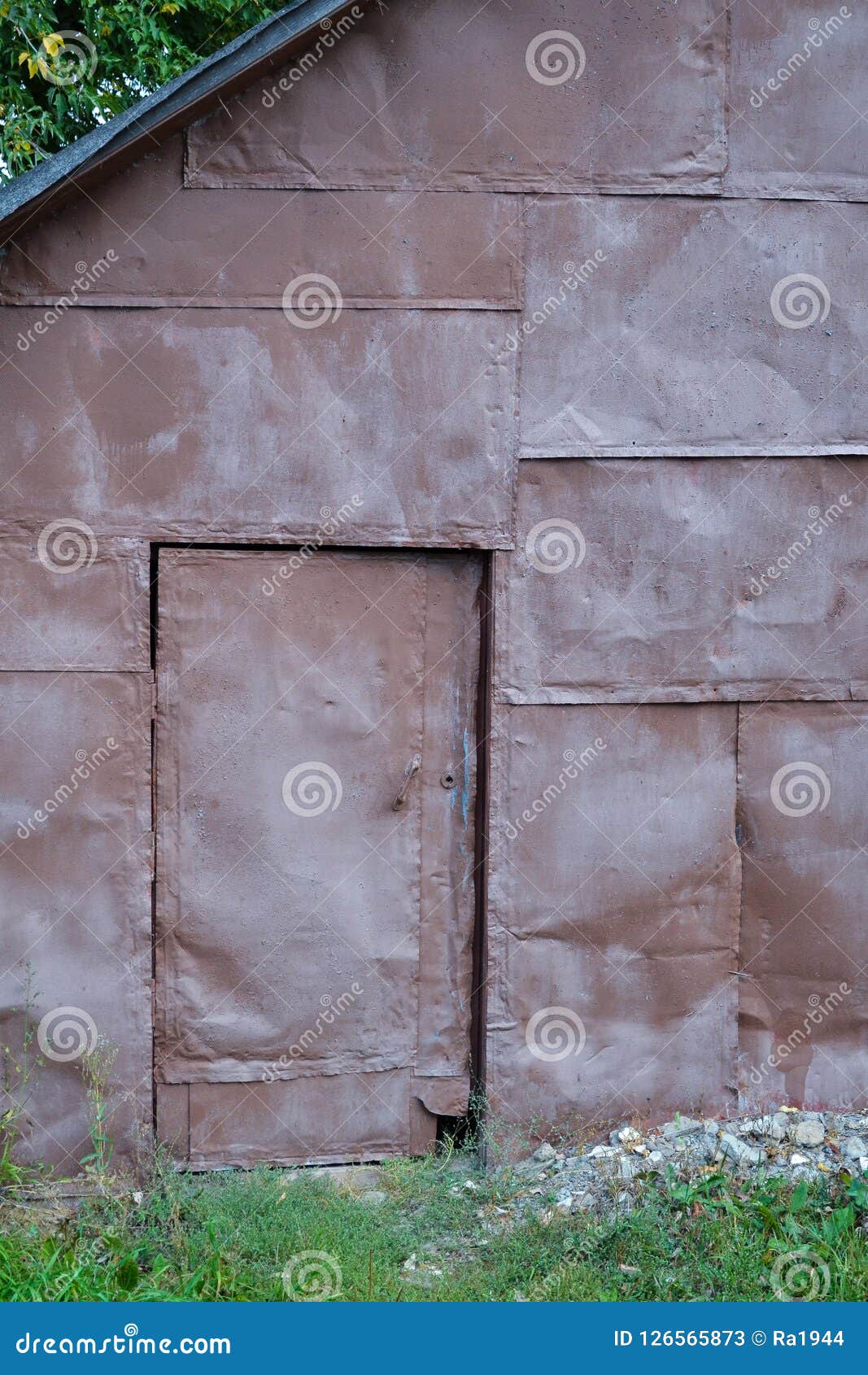 Wall of Sheets of Iron. the Door is Lined with Sheets of Iron Stock