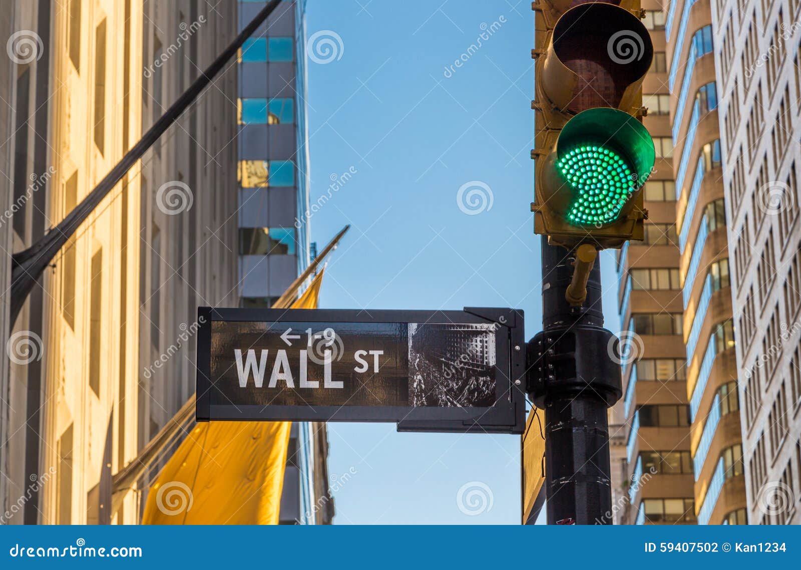 Wall Street Sign and Green Light. Stock Photo Image of finance