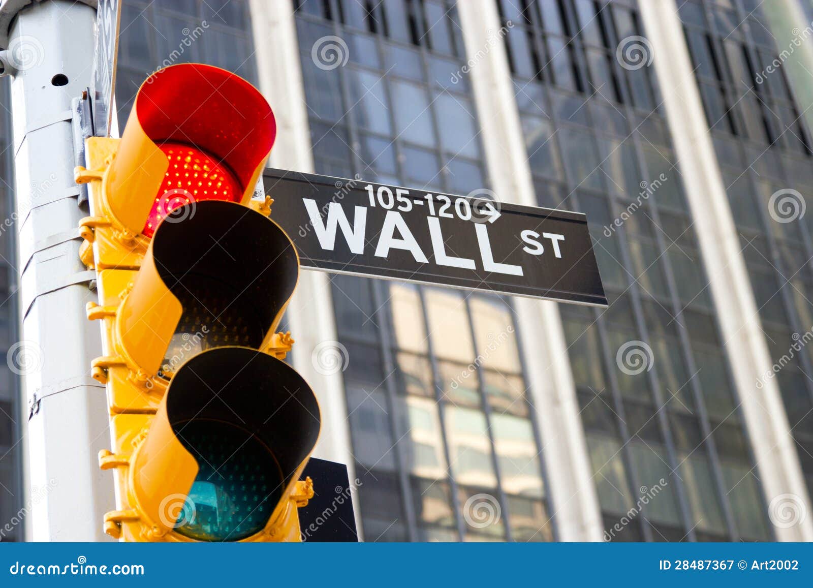 wall street sign and red traffic light, new york