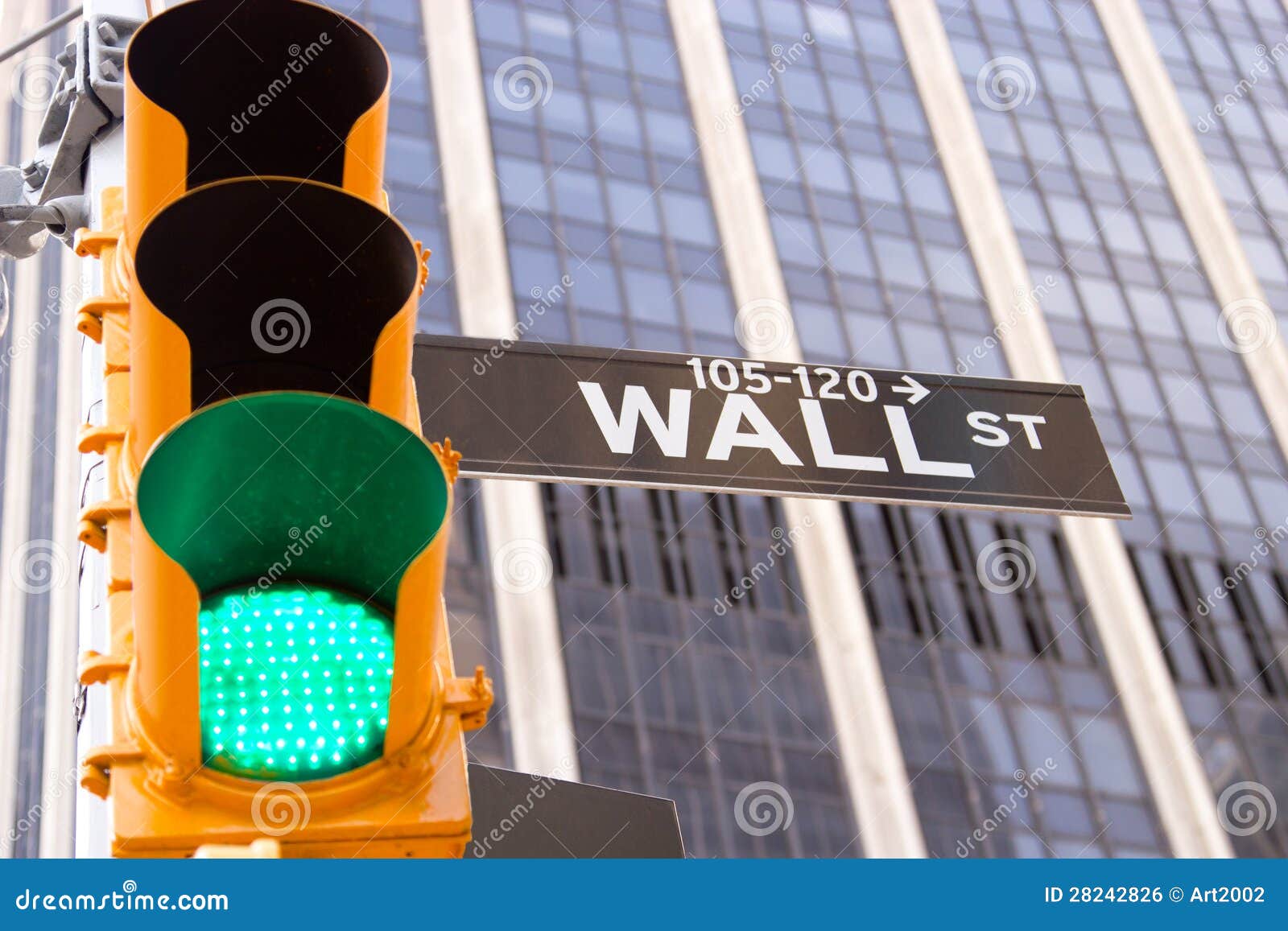 wall street sign and traffic light, new york