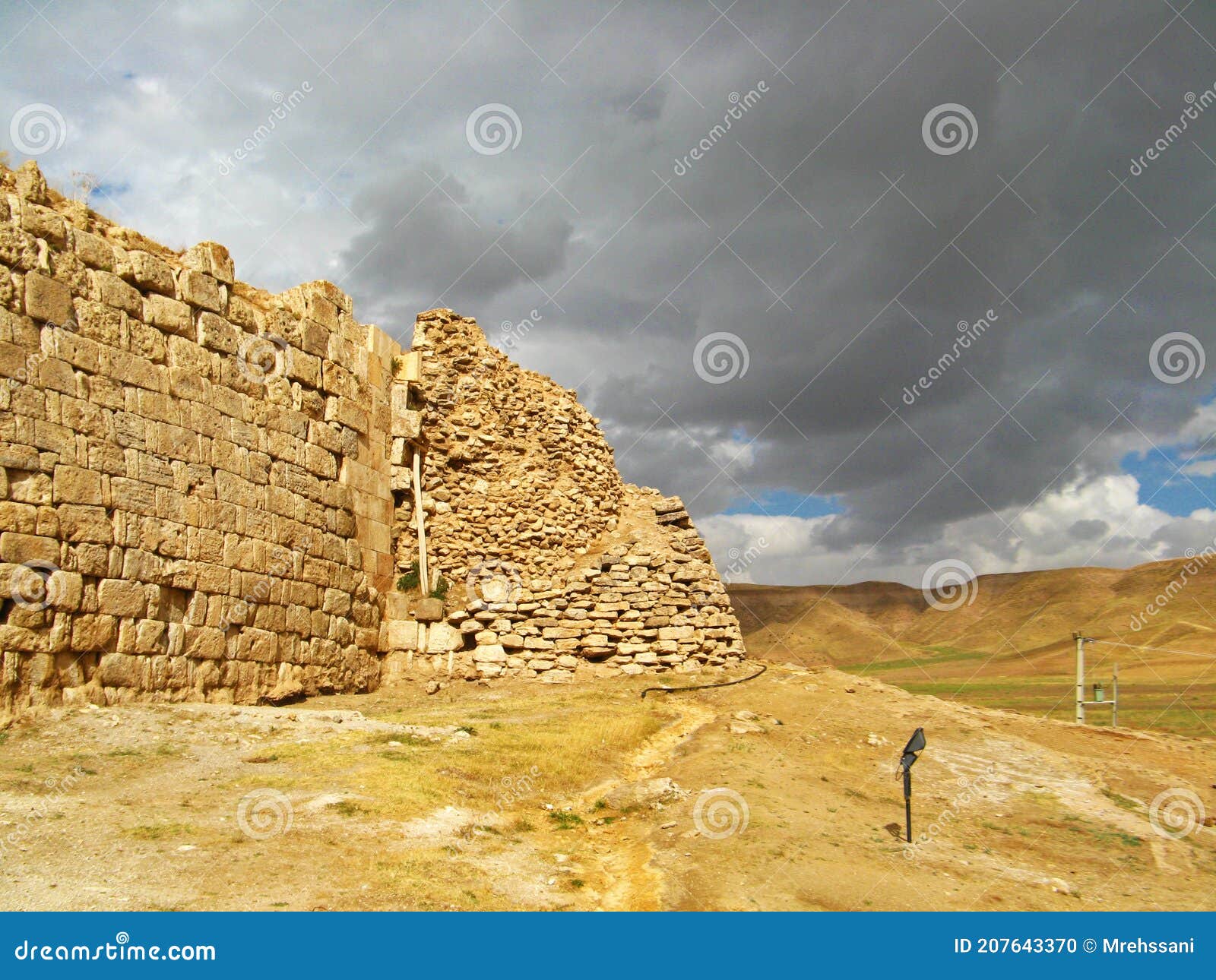 the wall of takht-e soleiman archaeological complex , unesco world heritage site in takab , iran