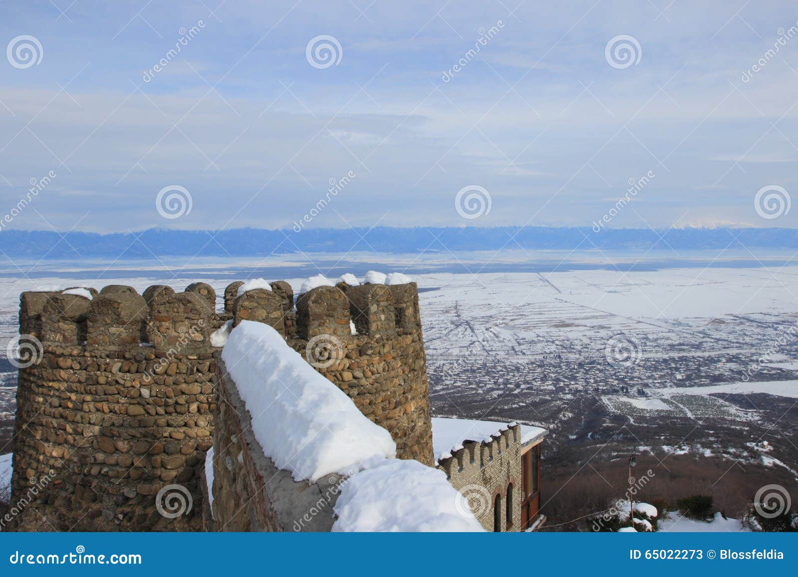 the wall and the tower of castle in sighnaghi town in winter