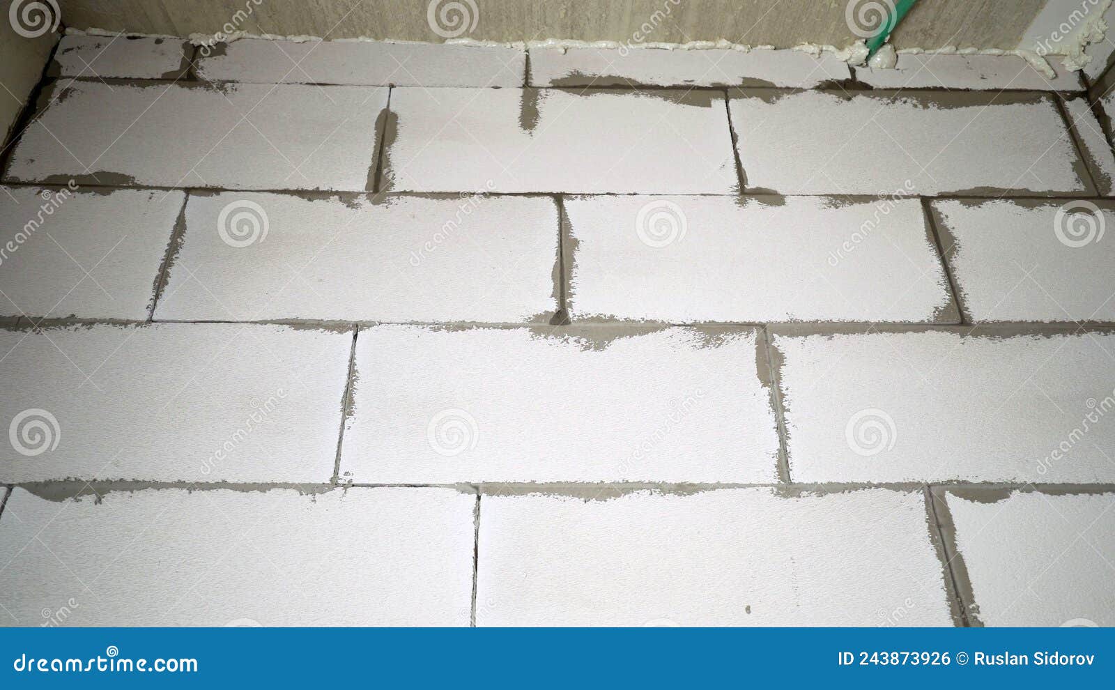 New Wall of Foam Concrete Bricks. Wall of White Foam Blocks. Stock Photo Image of construction