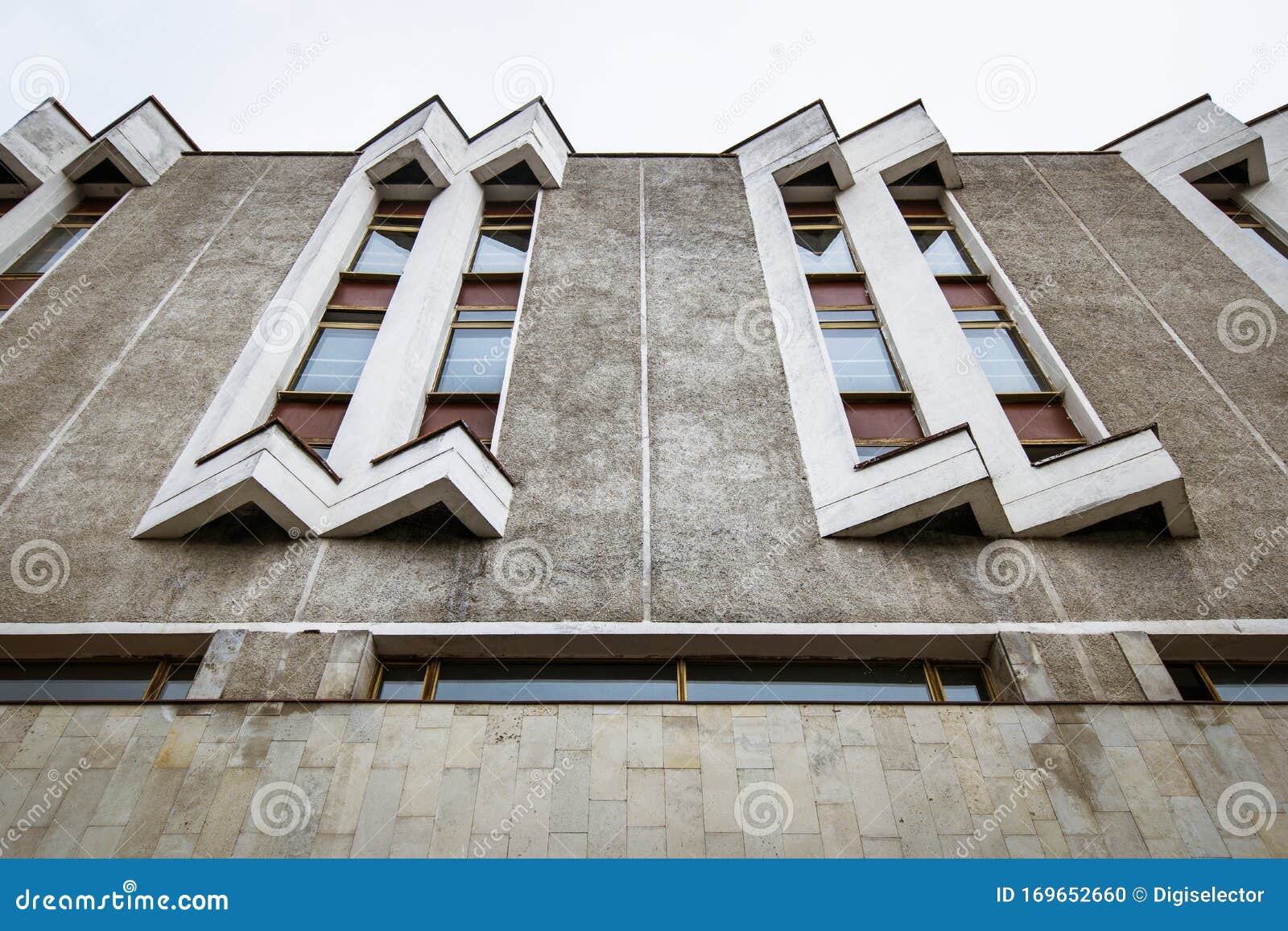 wall with windows fragment of building in saint-petersburg, russia, soviet modernism brutalism