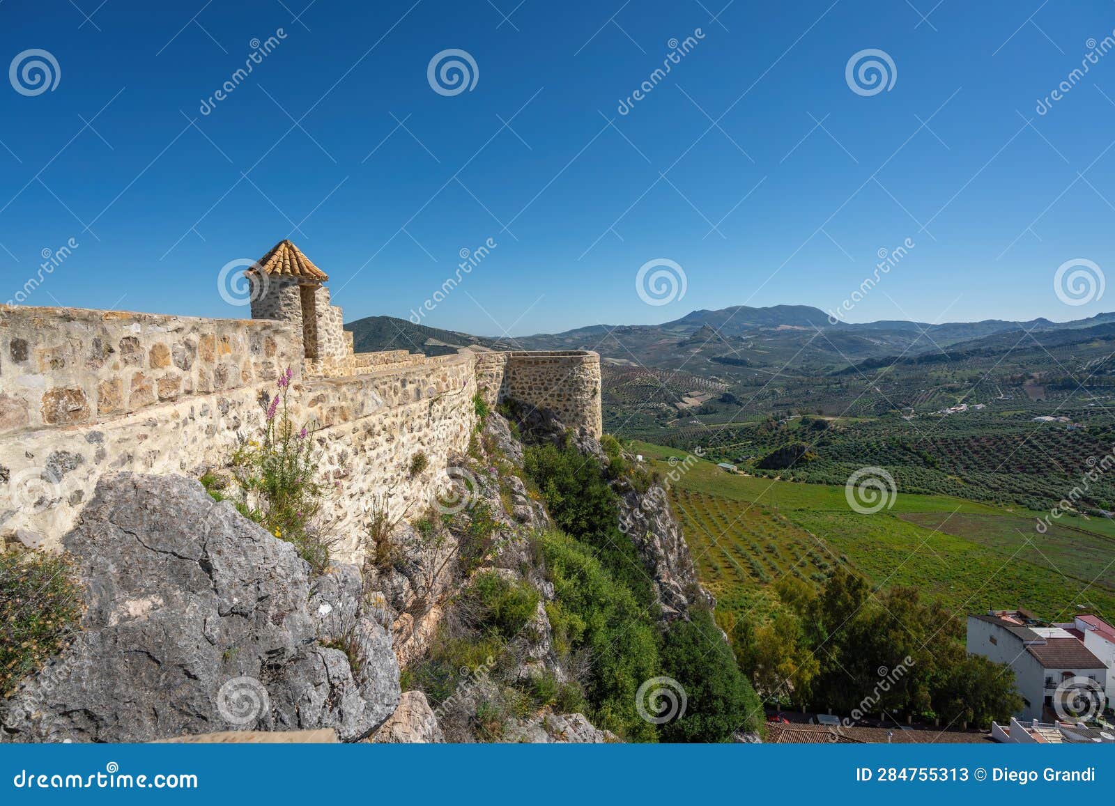 walls of olvera castle and sierra del tablon mountains view - olvera, andalusia, spain