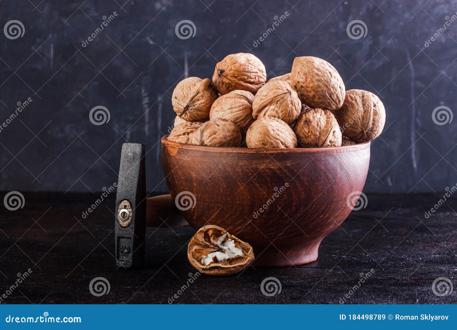 Walnut in a Clay Bowl and a Gout on a Concrete Background Stock Image Image of protein, fruit