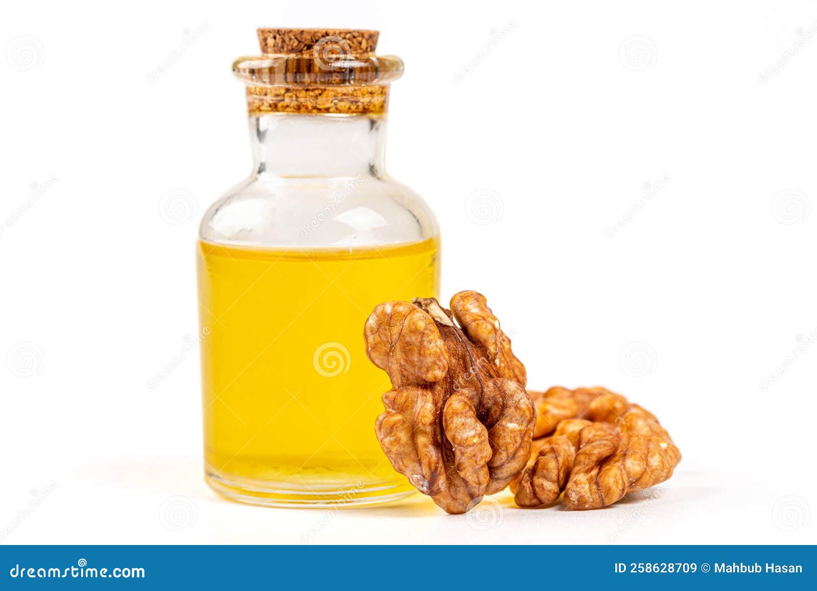 Walnut Essential Oil and Fresh, Unshelled Walnuts Stock Image Image