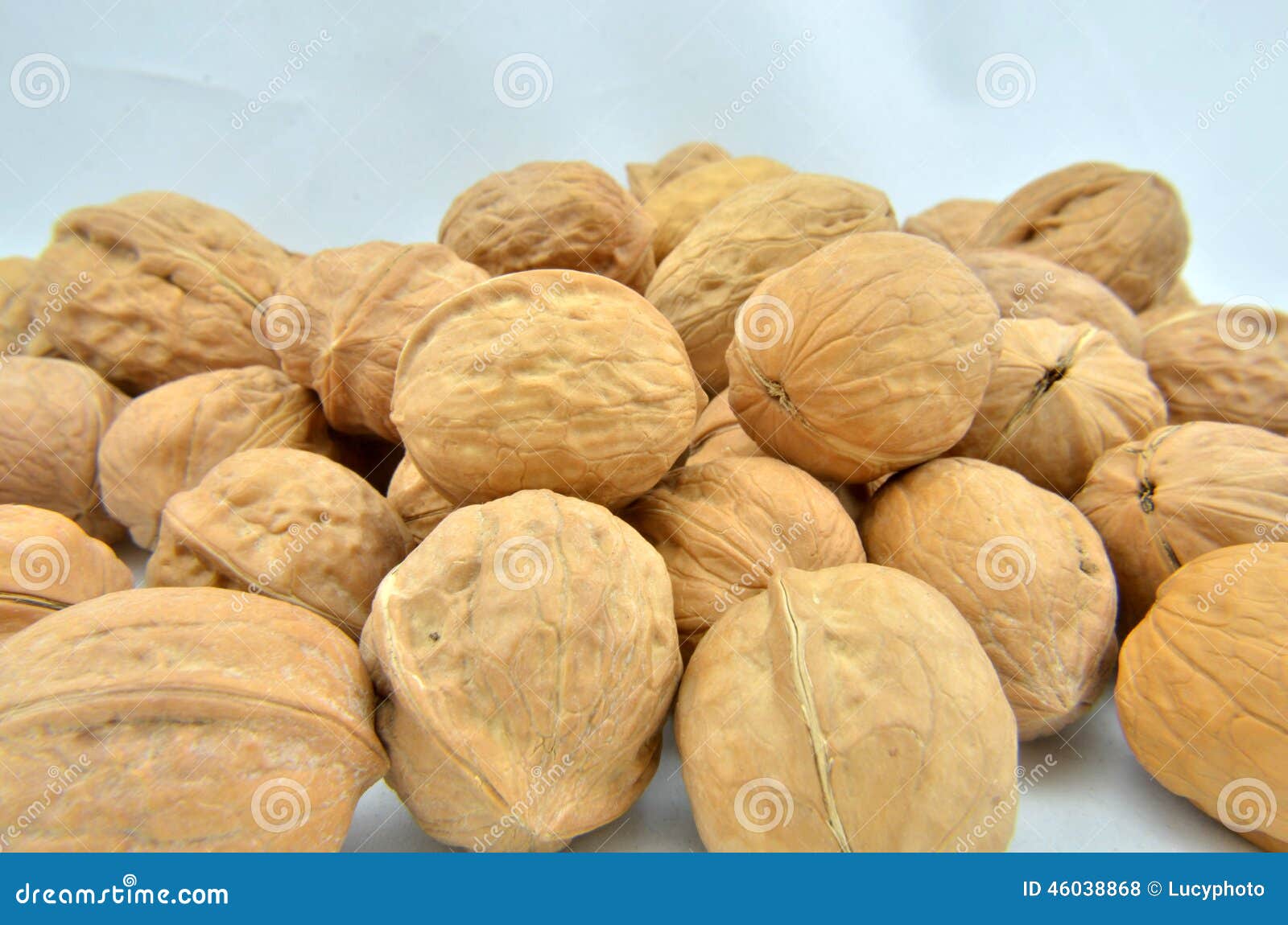 Walnut Pile Stacked Together on White Background Stock Photo Image of