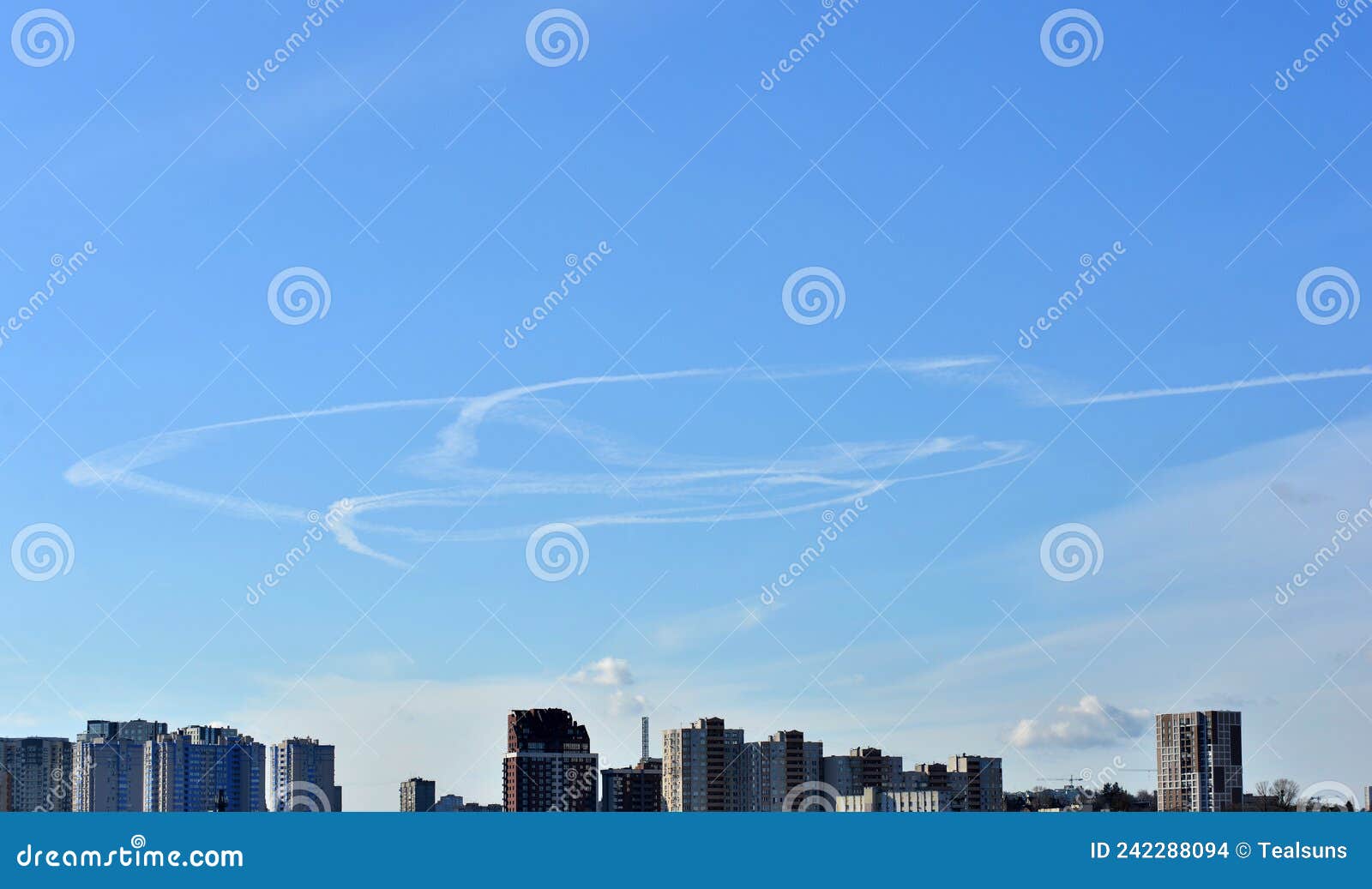 war ukraine russia. contrails of an unknown aircraft in the sky over the capital