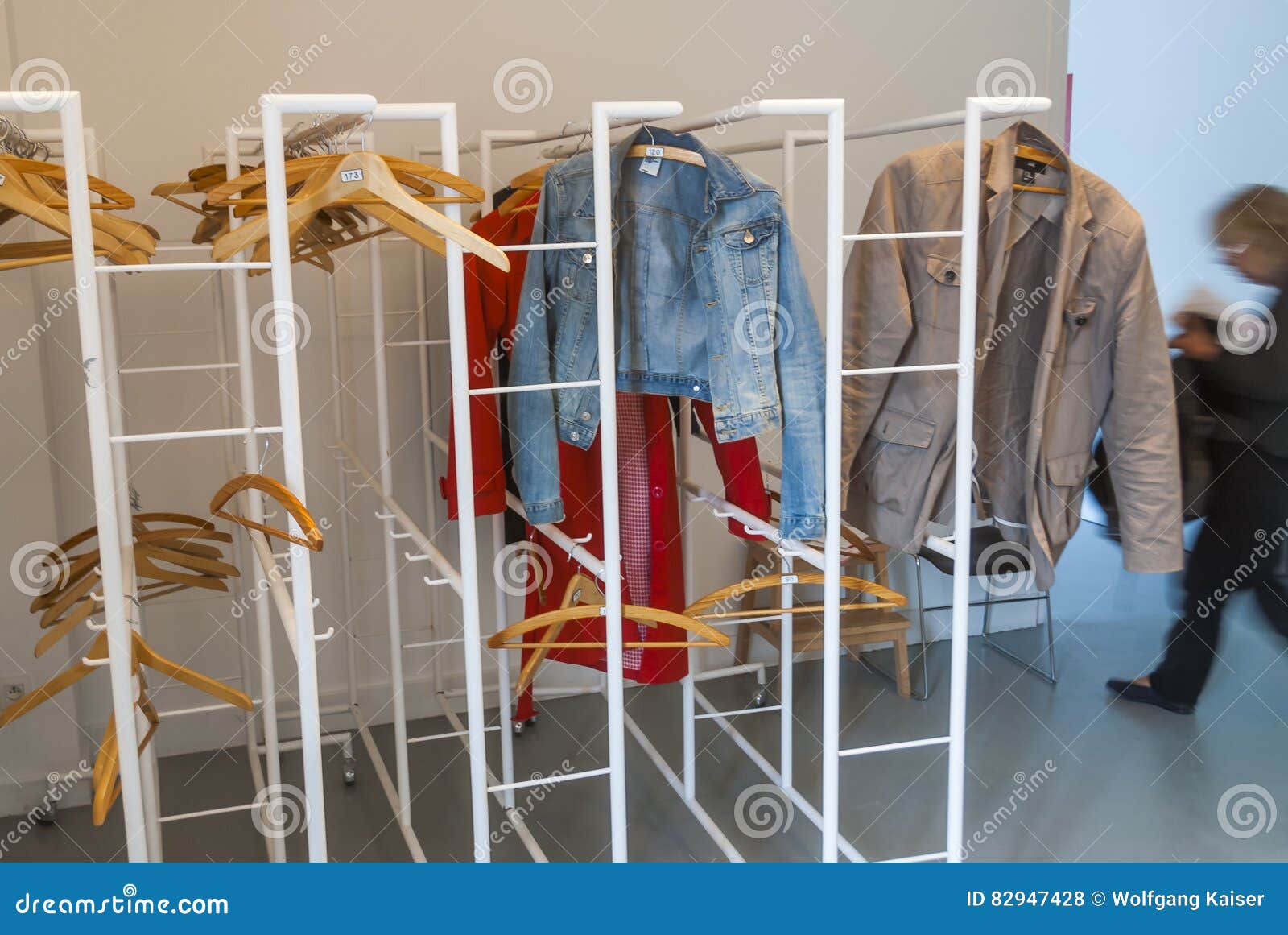 Wardrobe lady in action stock photo. Image of dress, coat 82947428