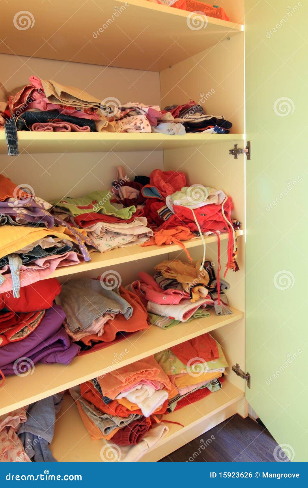 Wardrobe with Child Clothes on Shelves Stock Photo Image of baby