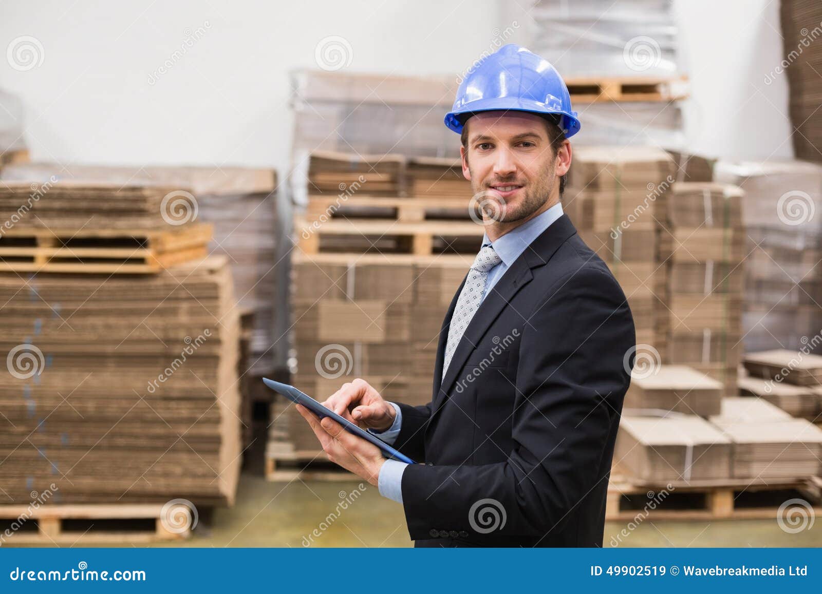 Warehouse Manager Wearing Hard Hat Using Tablet Stock Image Image of
