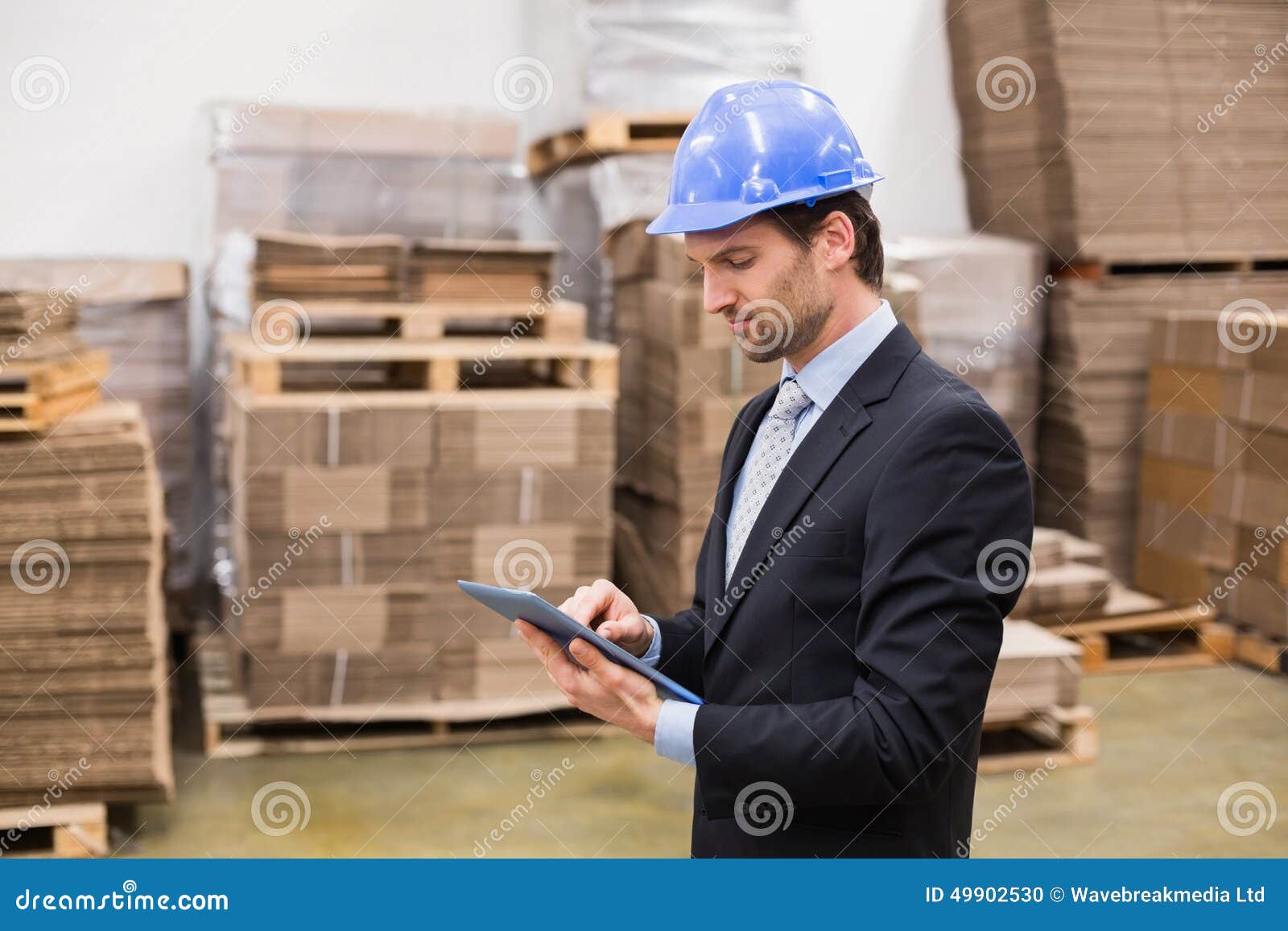 Warehouse Manager Wearing Hard Hat Using Tablet Stock Photo Image of
