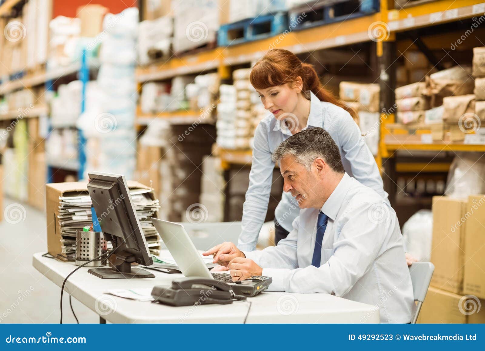 Warehouse Managers Working Together on Laptop Stock Image Image of