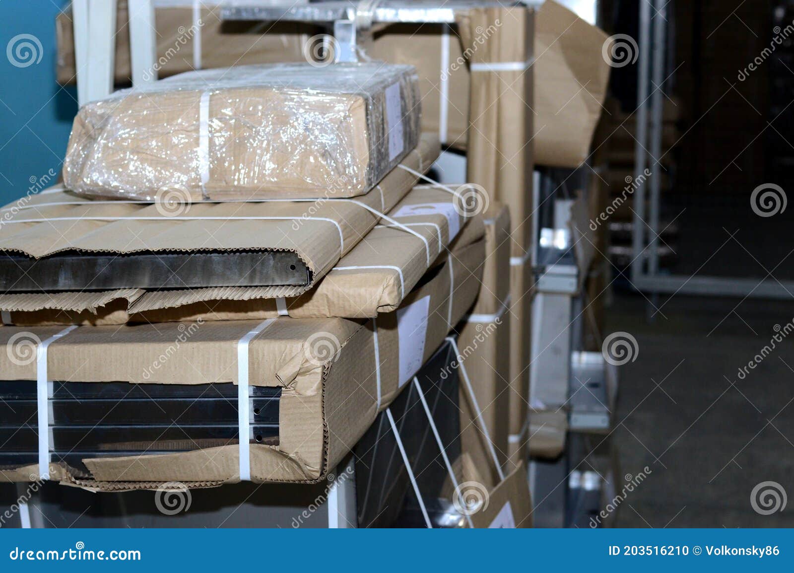 Warehouse with Metal Products in Cardboard Packaging Stock Photo