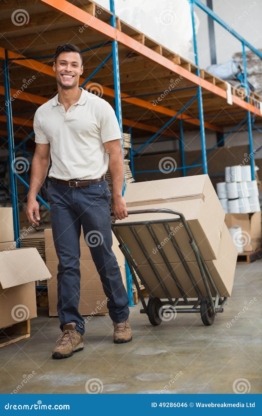 Warehouse Worker Moving Boxes On Trolley Stock Photo Image 49286046