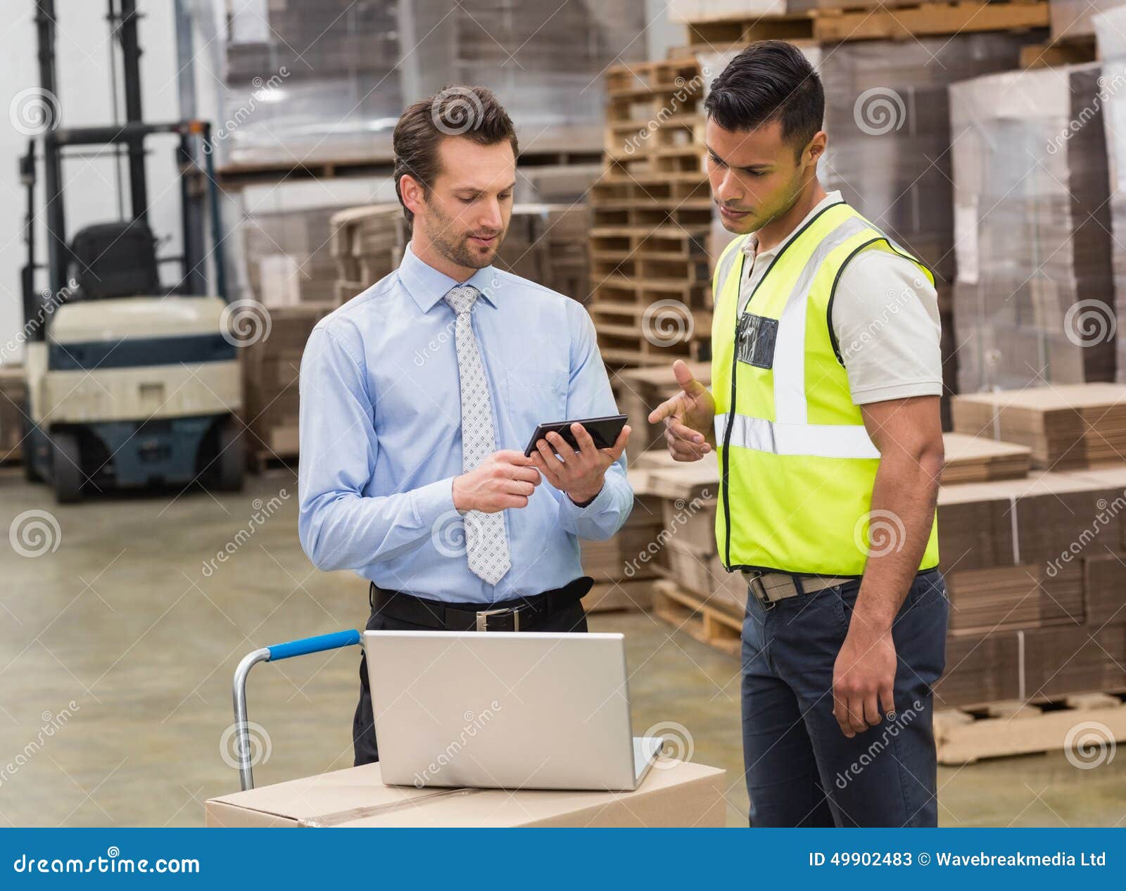 Warehouse Worker Talking with His Manager Stock Image Image of mobile