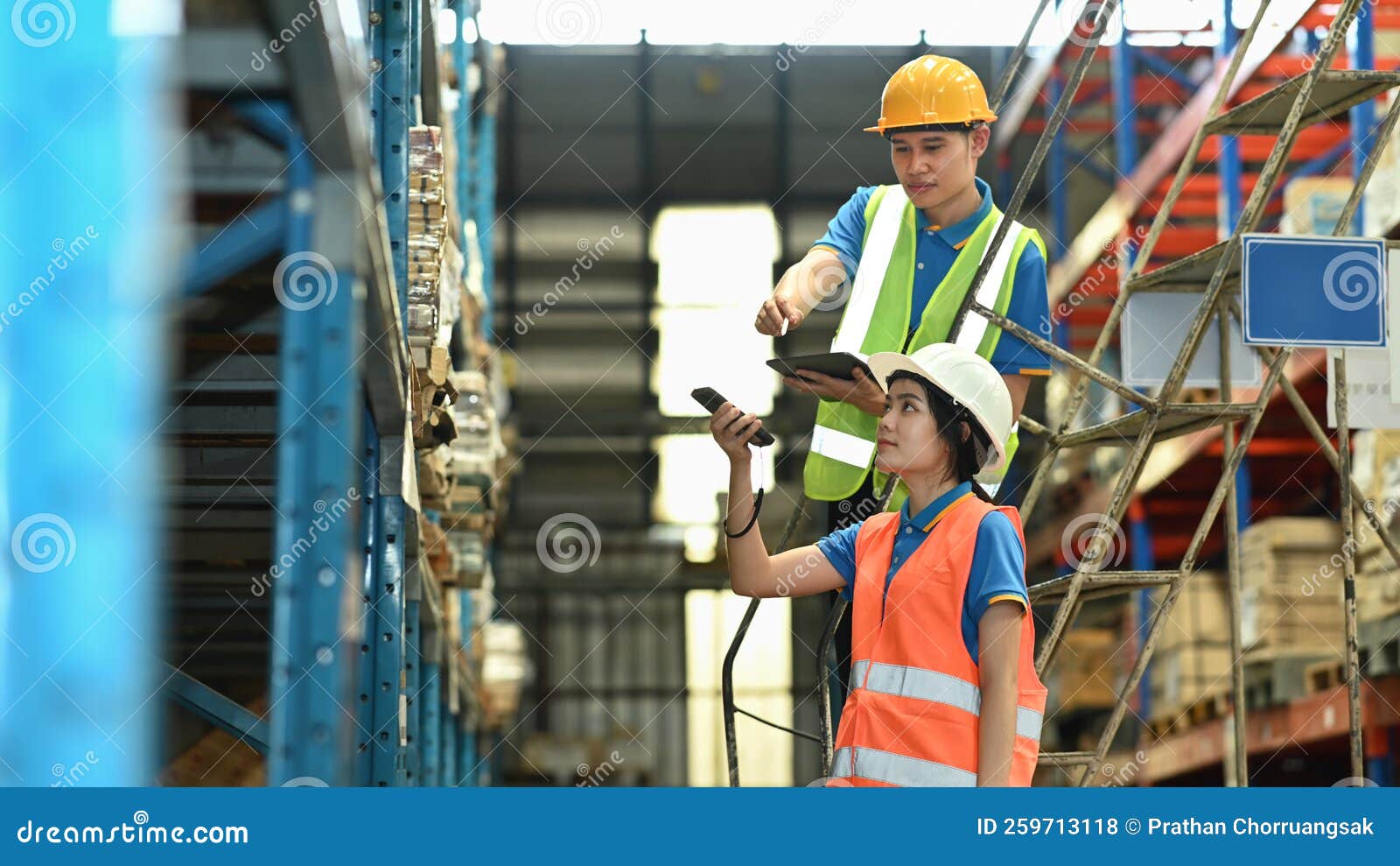 Warehouse Worker are Using Barcode Scanner Checking Stock on Shelves in a Retail Warehouse Stock