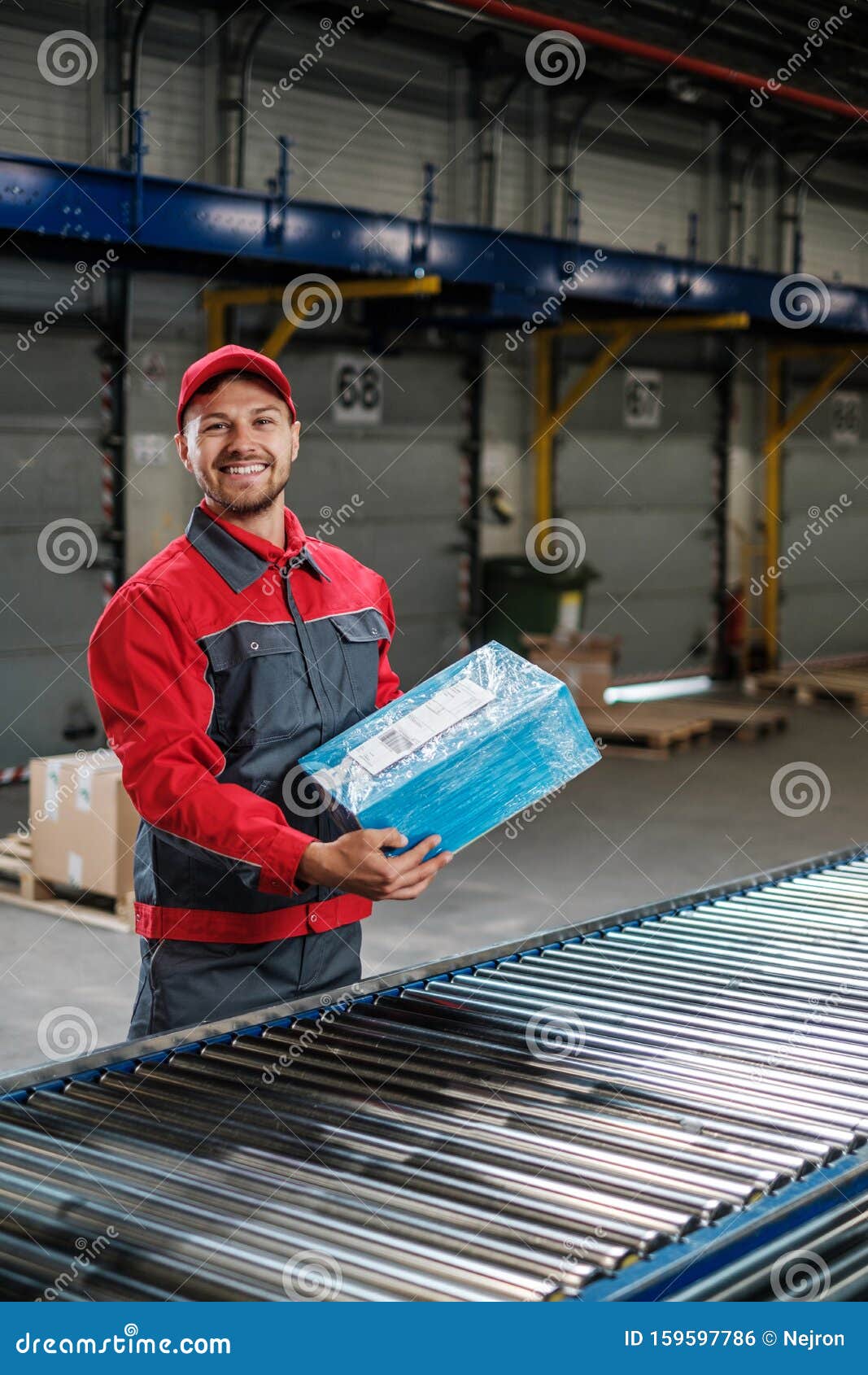 Warehouse Worker Working on a Conveyor Line Stock Photo Image of