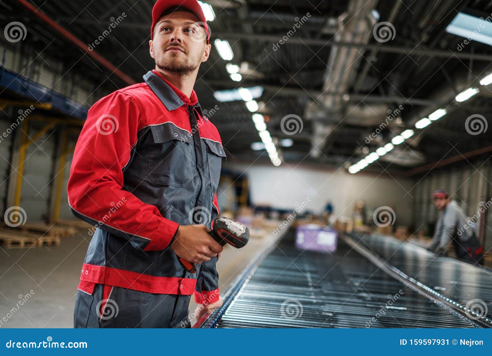 Warehouse Worker Working on a Conveyor Line Stock Image Image of