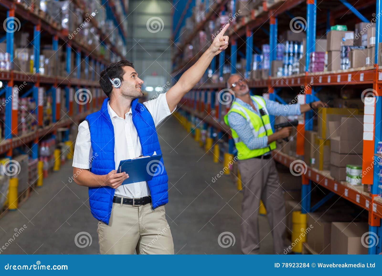 Warehouse Workers Interacting with Each Other Stock Photo Image of