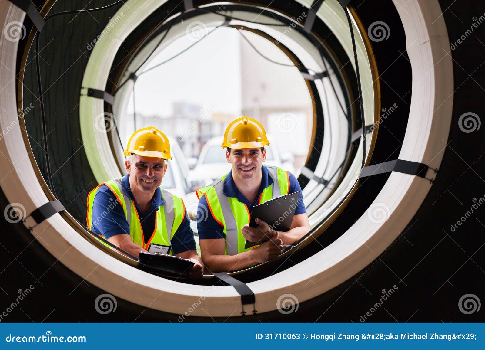 Warehouse workers tires stock image. Image of helmet 31710063